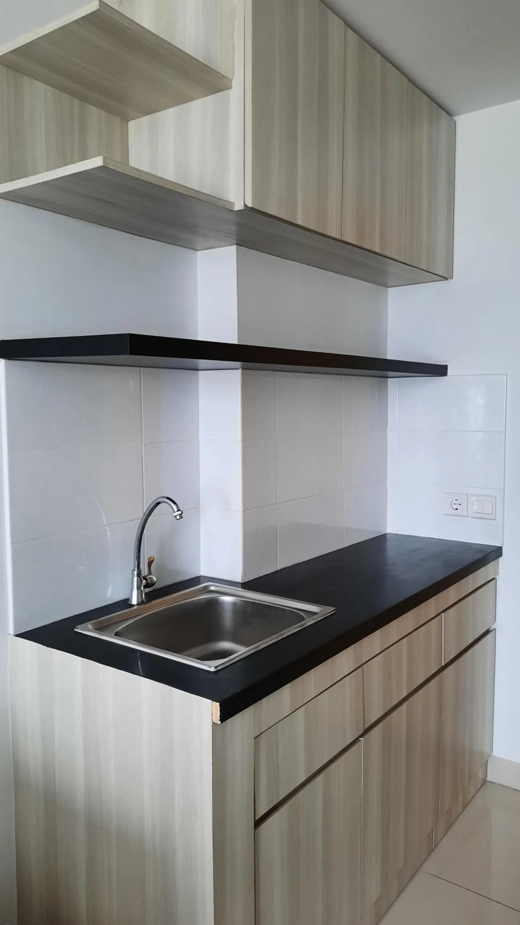 kitchen in Azalea Suites Cikarang by Jayakarta Group