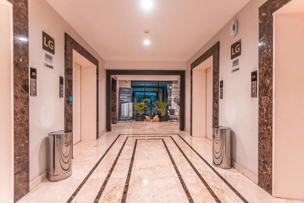 Lobby or reception in Azalea Suites Cikarang by Jayakarta Group