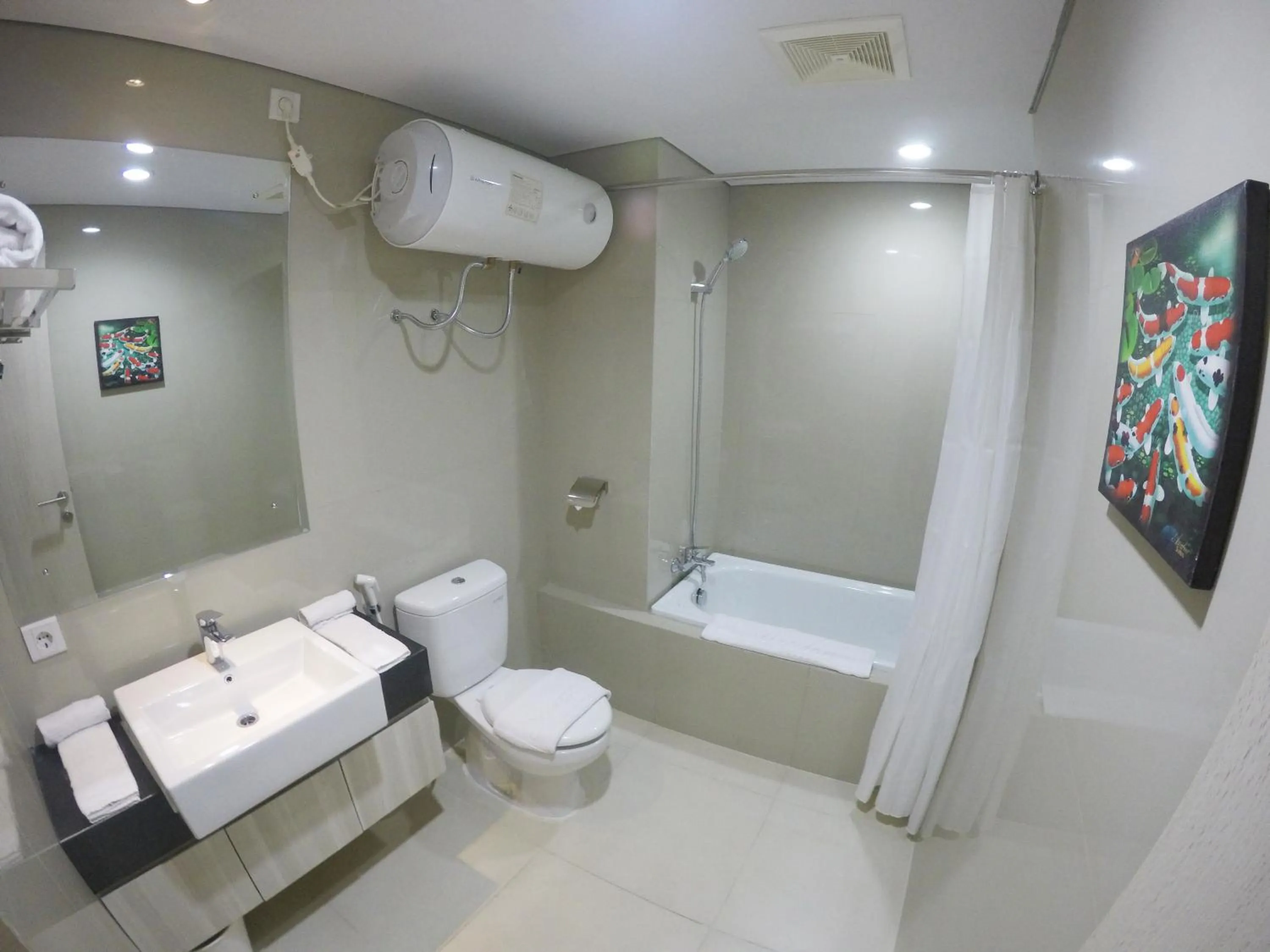 Bathroom in Azalea Suites Cikarang by Jayakarta Group