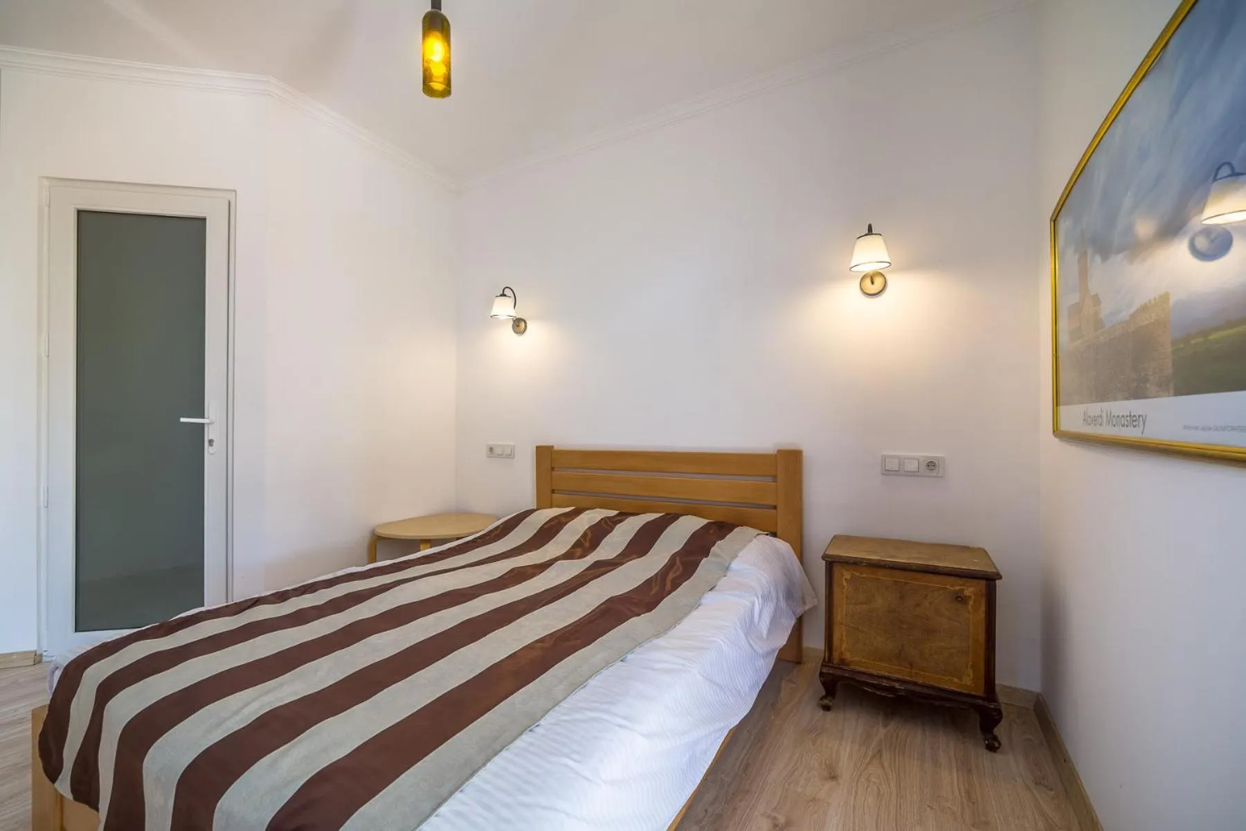 Photo of the whole room, Bed in Chateau Napareuli