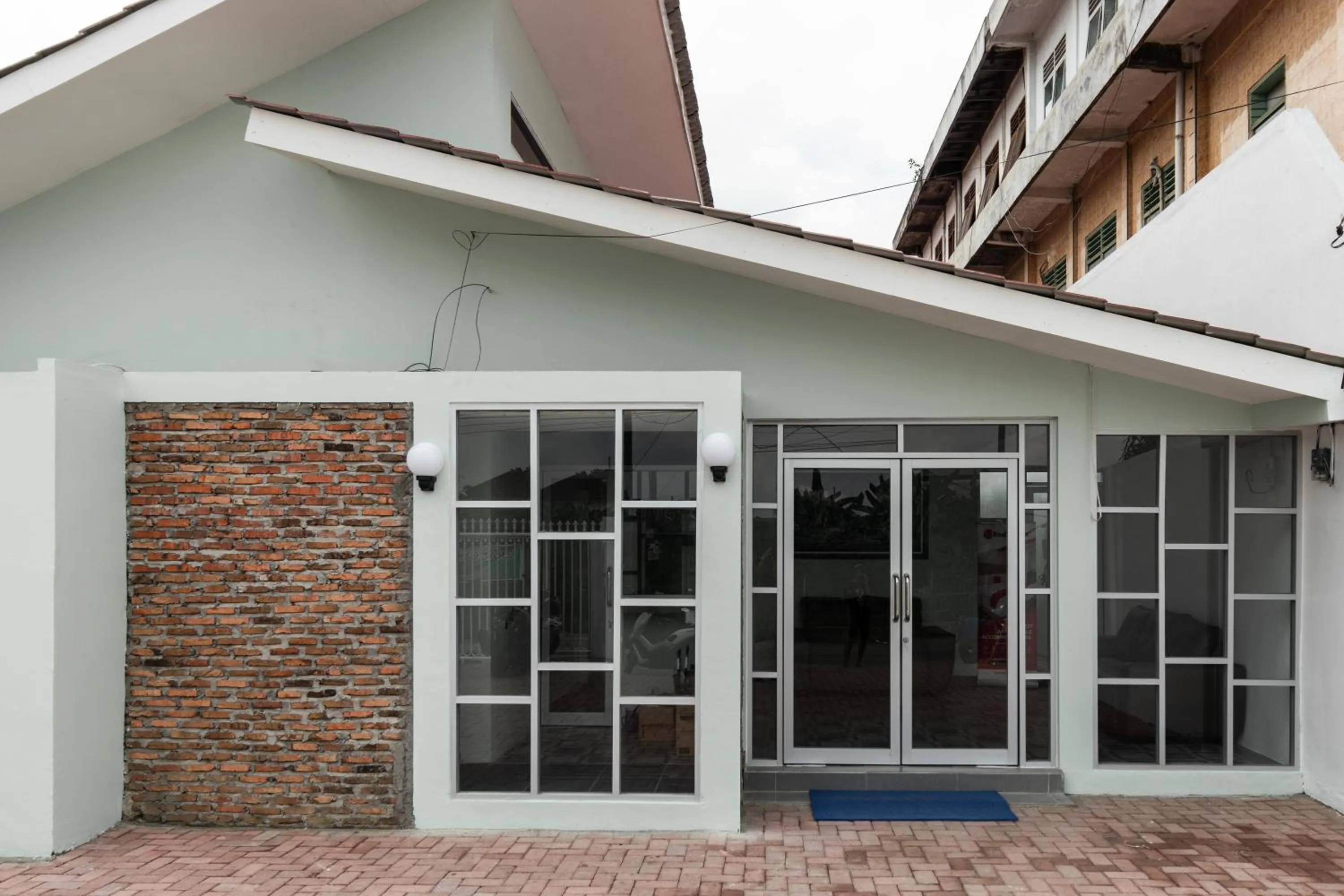 Property logo or sign in RedDoorz Plus near RS USU Medan 2