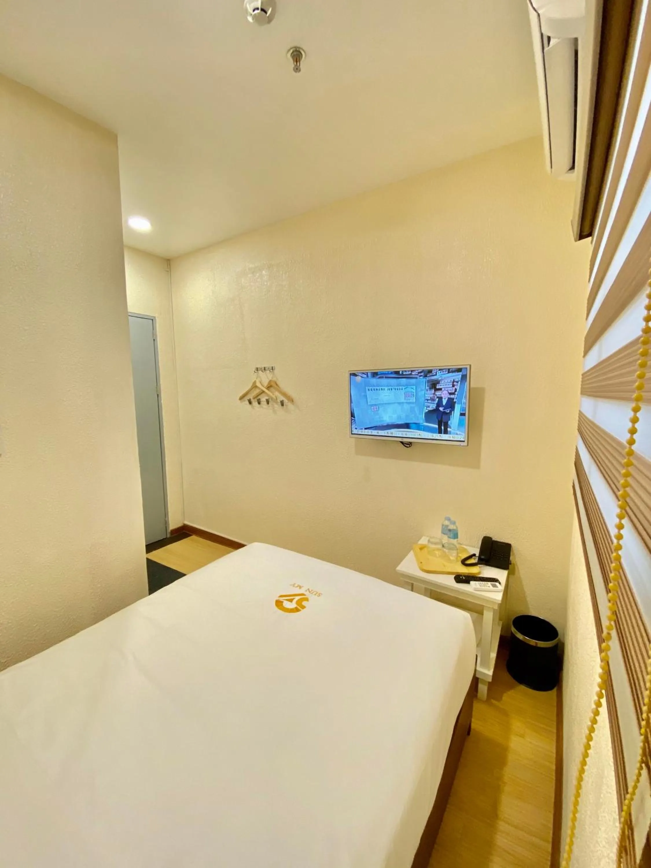 Photo of the whole room, Bed in SUN MY HOTEL