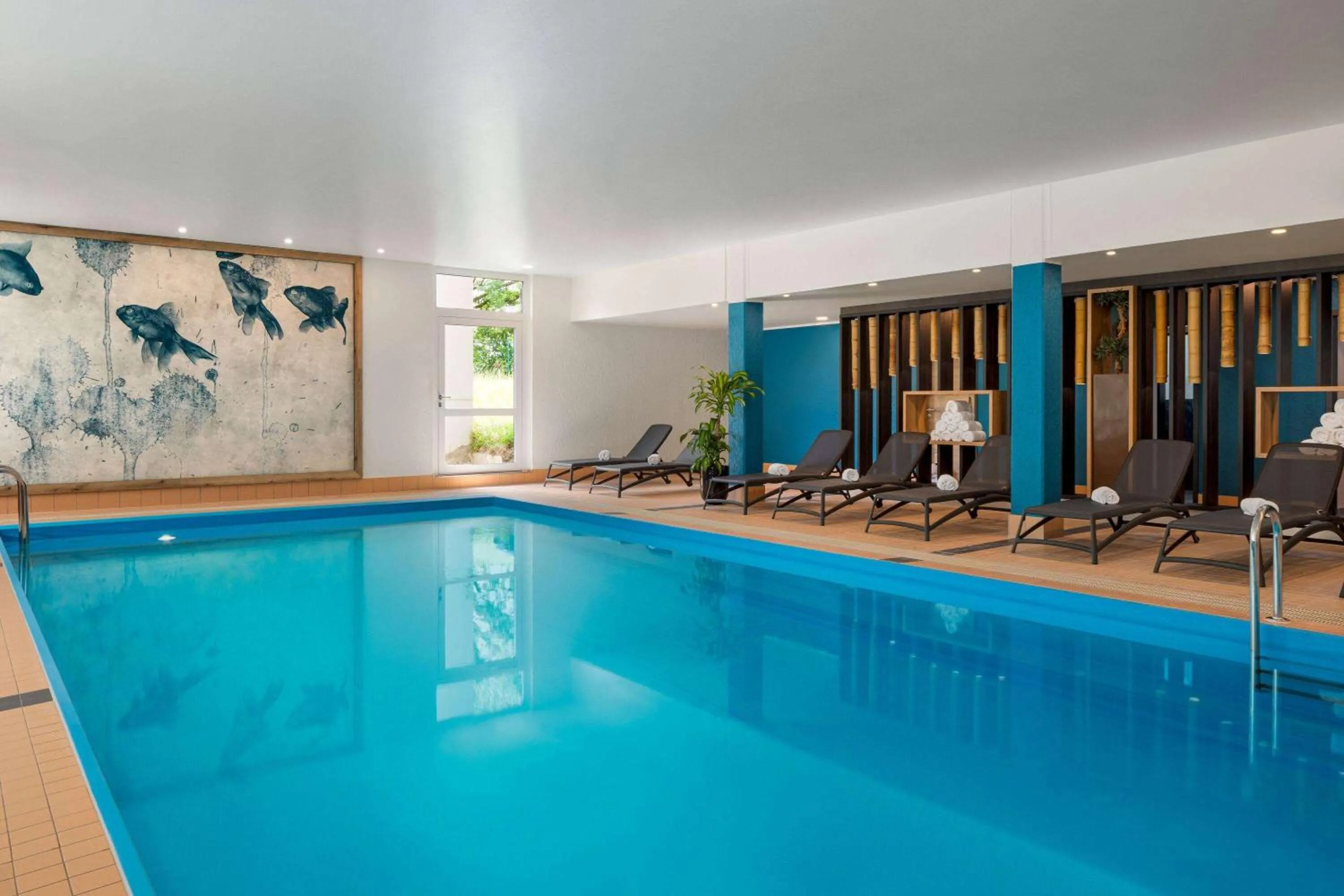 Swimming pool in Vienna House Easy by Wyndham Frankfurt Airport