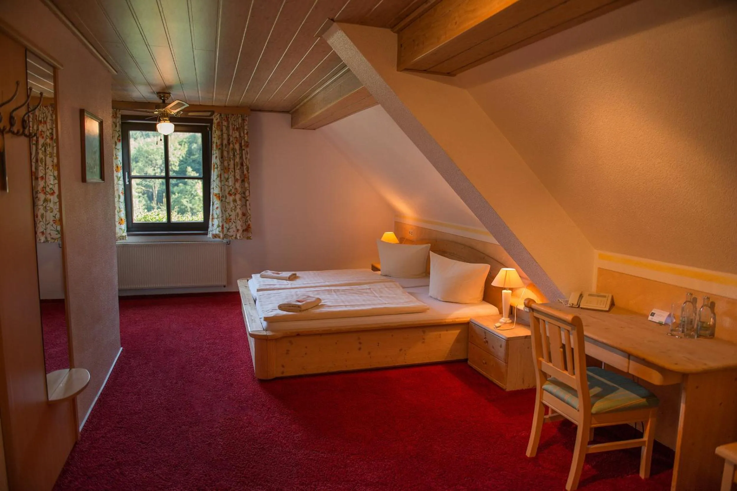 Photo of the whole room, Bed in Flair-Waldhotel Mellestollen