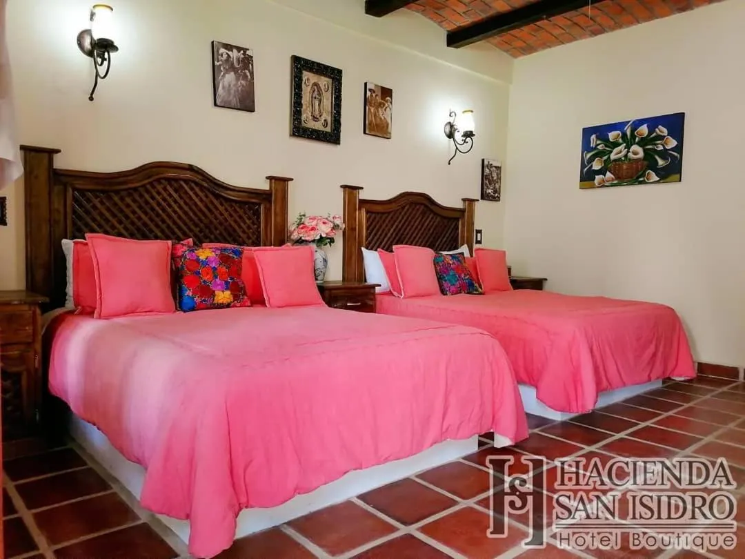 Bed in Hotel Hacienda San Isidro