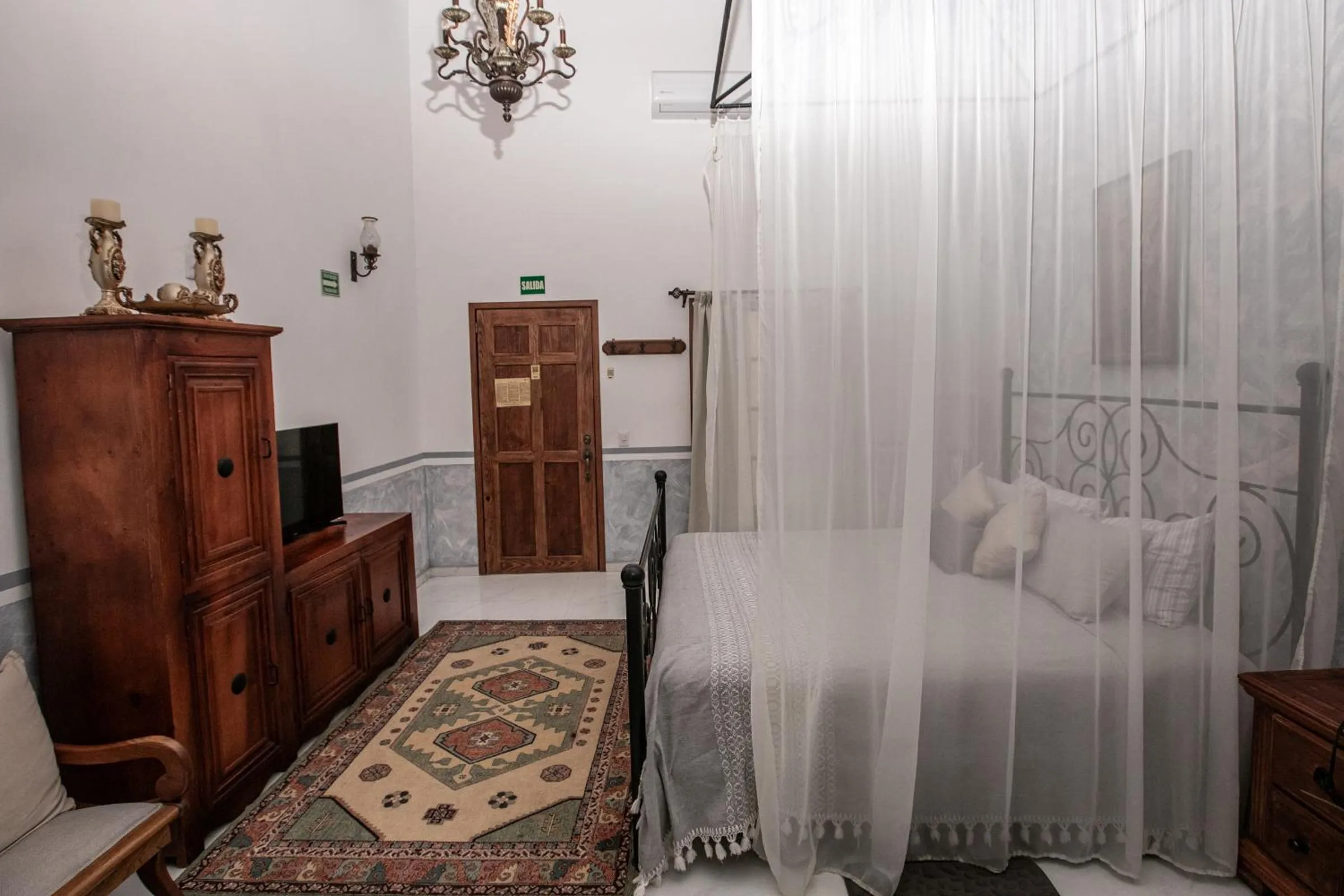 Bedroom, Bed in Hotel Hacienda San Isidro