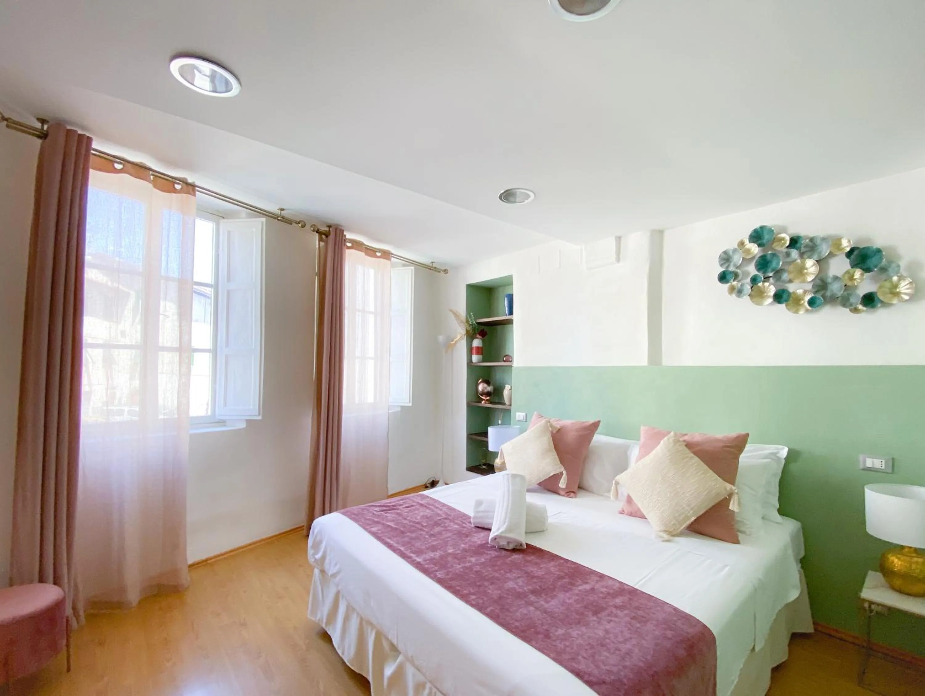 Bed in OROROSA Lucca City Center Apartment