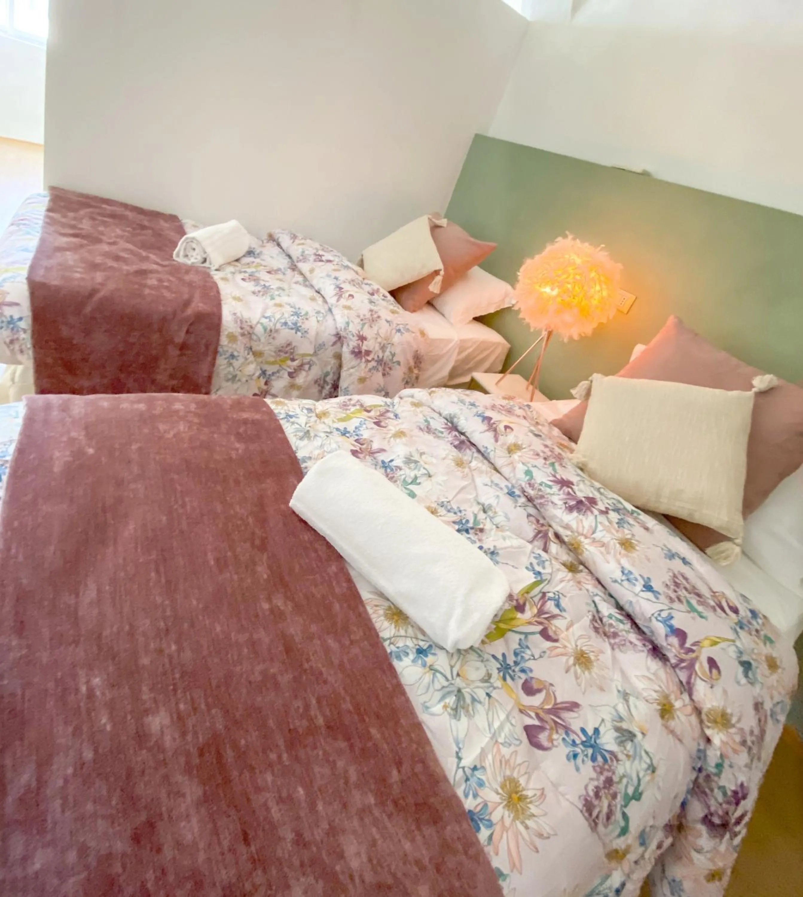 Bed in OROROSA Lucca City Center Apartment