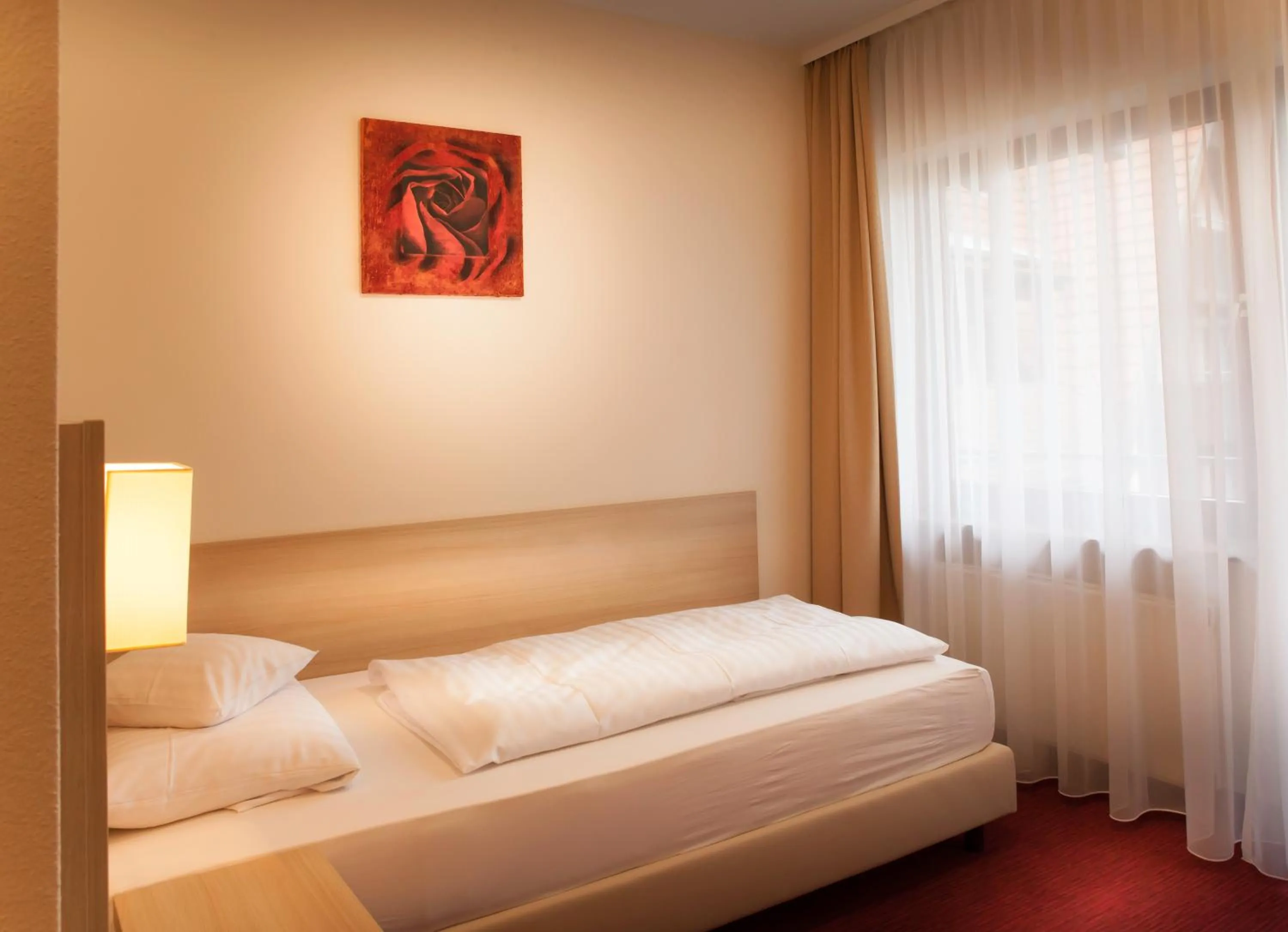 Bed in Flair Hotel Weinstube Lochner