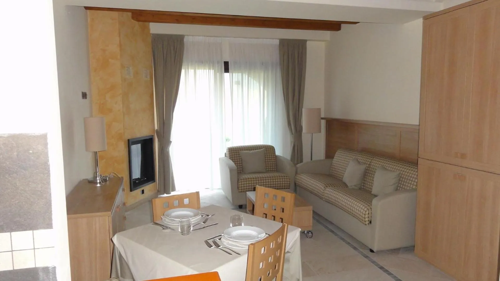 Communal lounge/ TV room in Tassido Coda Resort