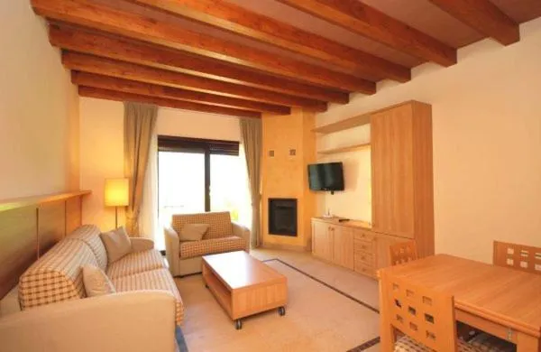 Communal lounge/ TV room in Tassido Coda Resort