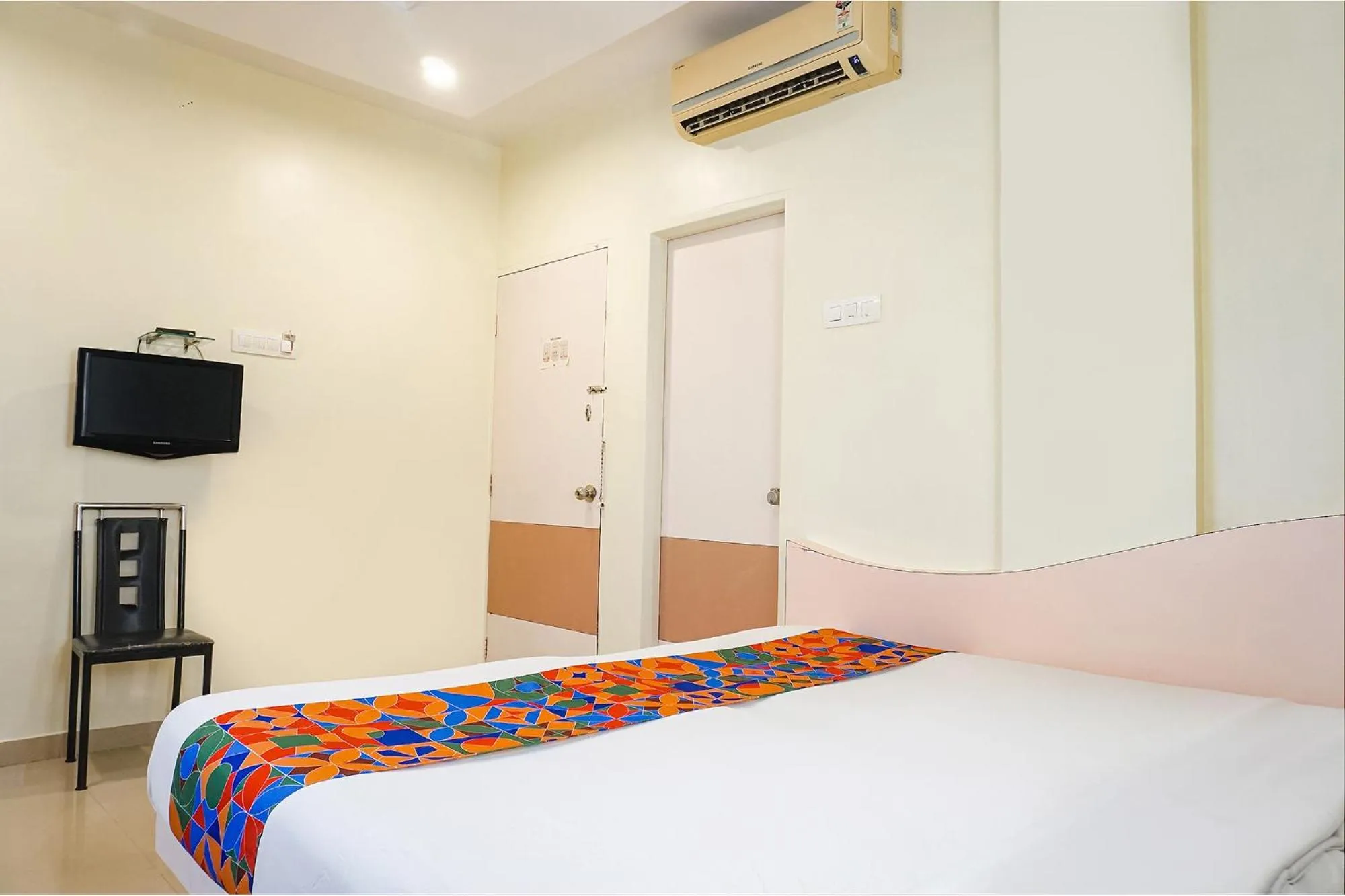 Bed in FabHotel Shree Swami, Nr Bird Valley Udyan
