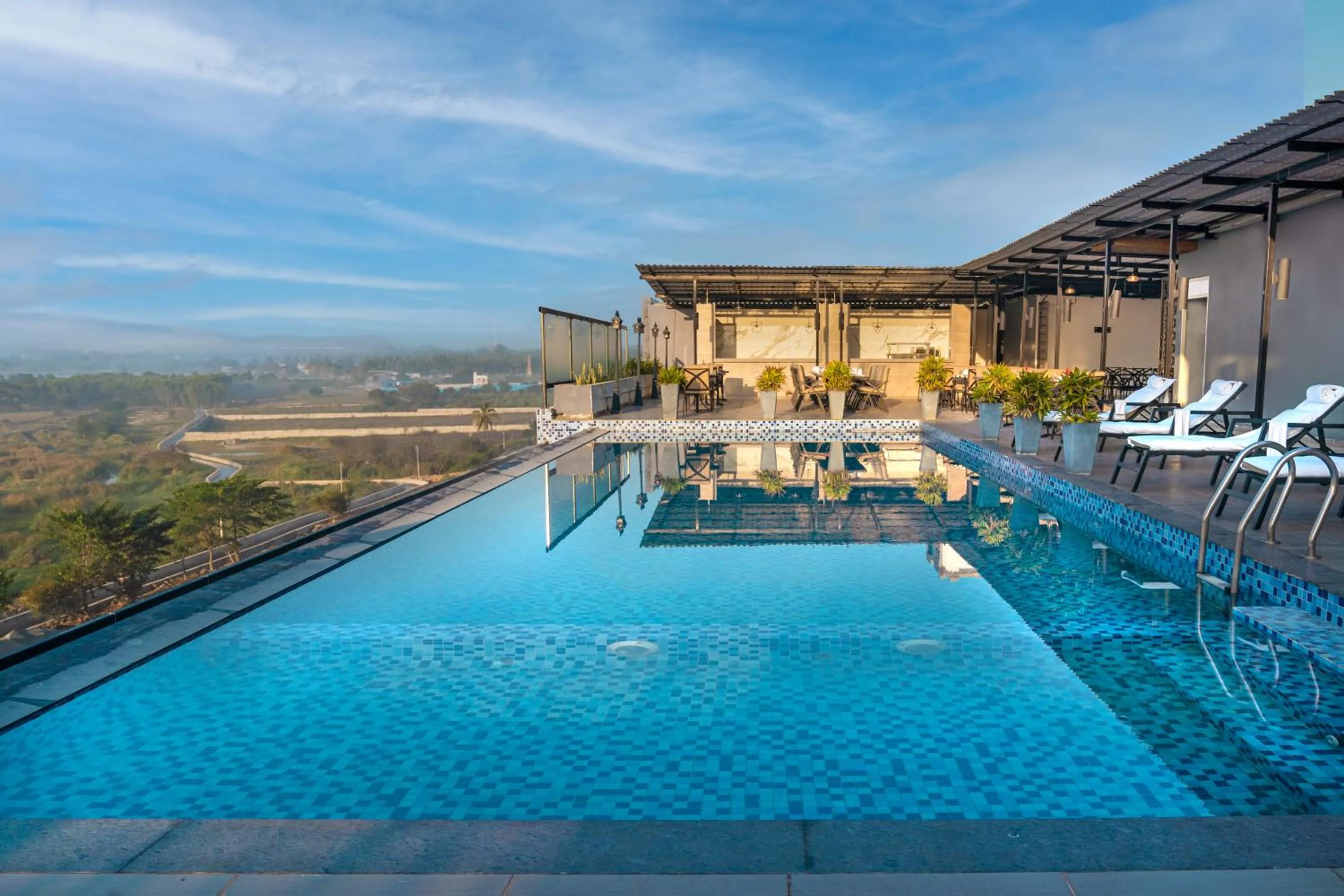 Swimming pool in The Elite Narasapura, a member of Radisson Individuals