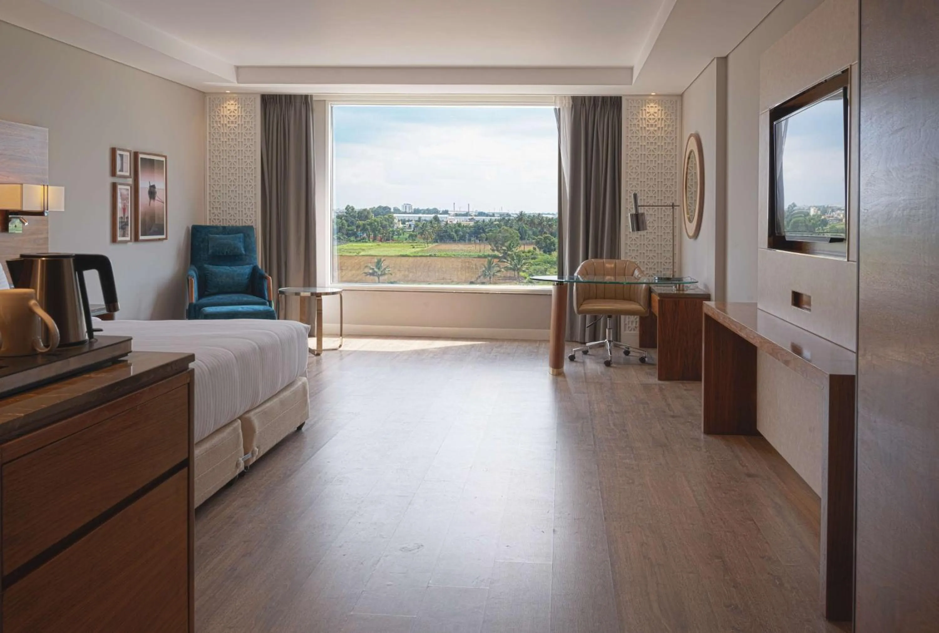 Photo of the whole room, Bed in The Elite Narasapura, a member of Radisson Individuals