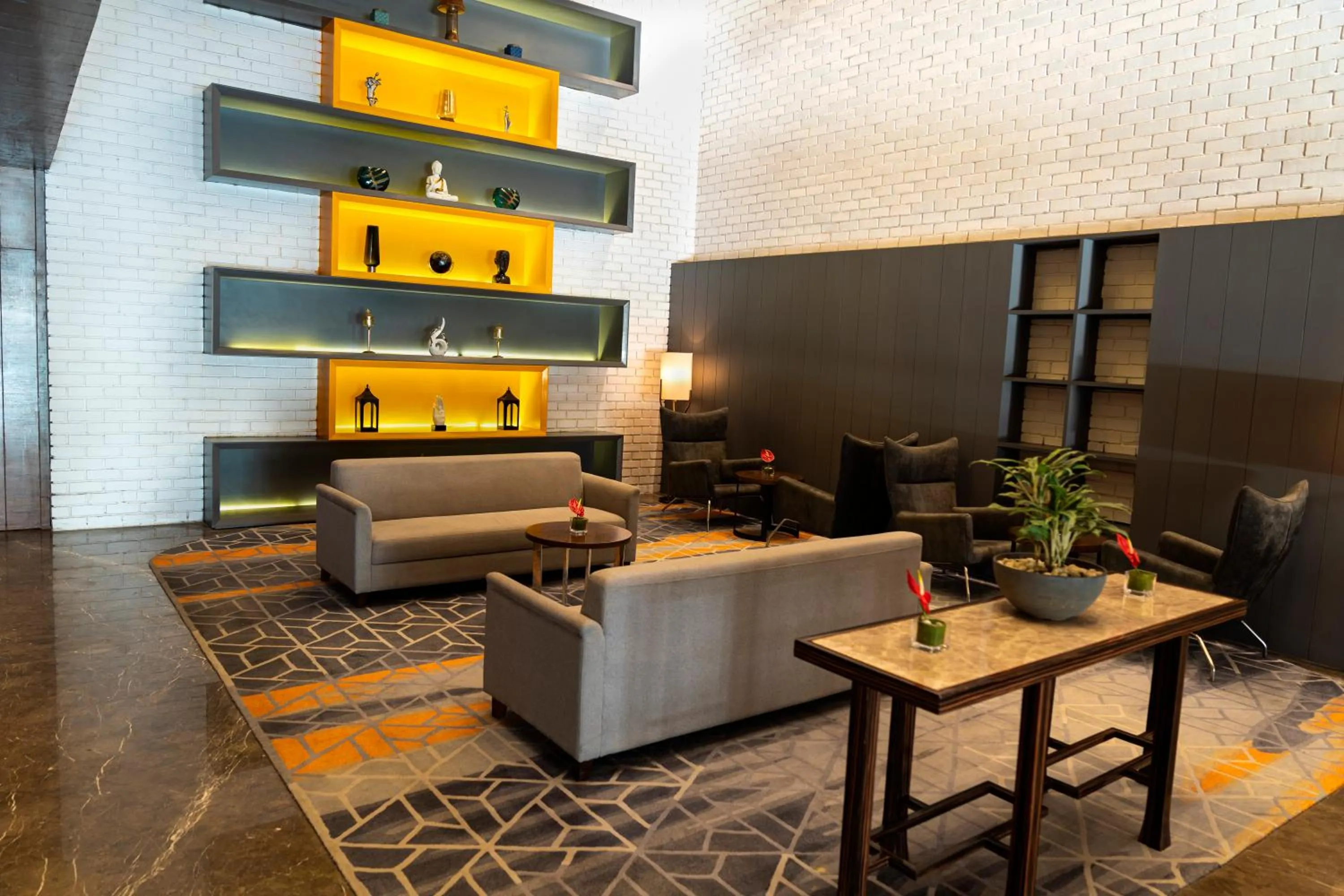 Seating area in The Elite Narasapura, a member of Radisson Individuals