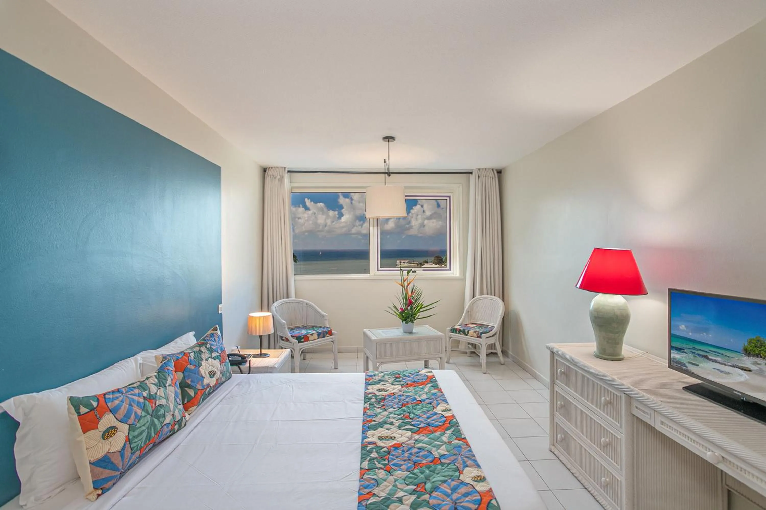 Bed in Karibea Squash Hôtel