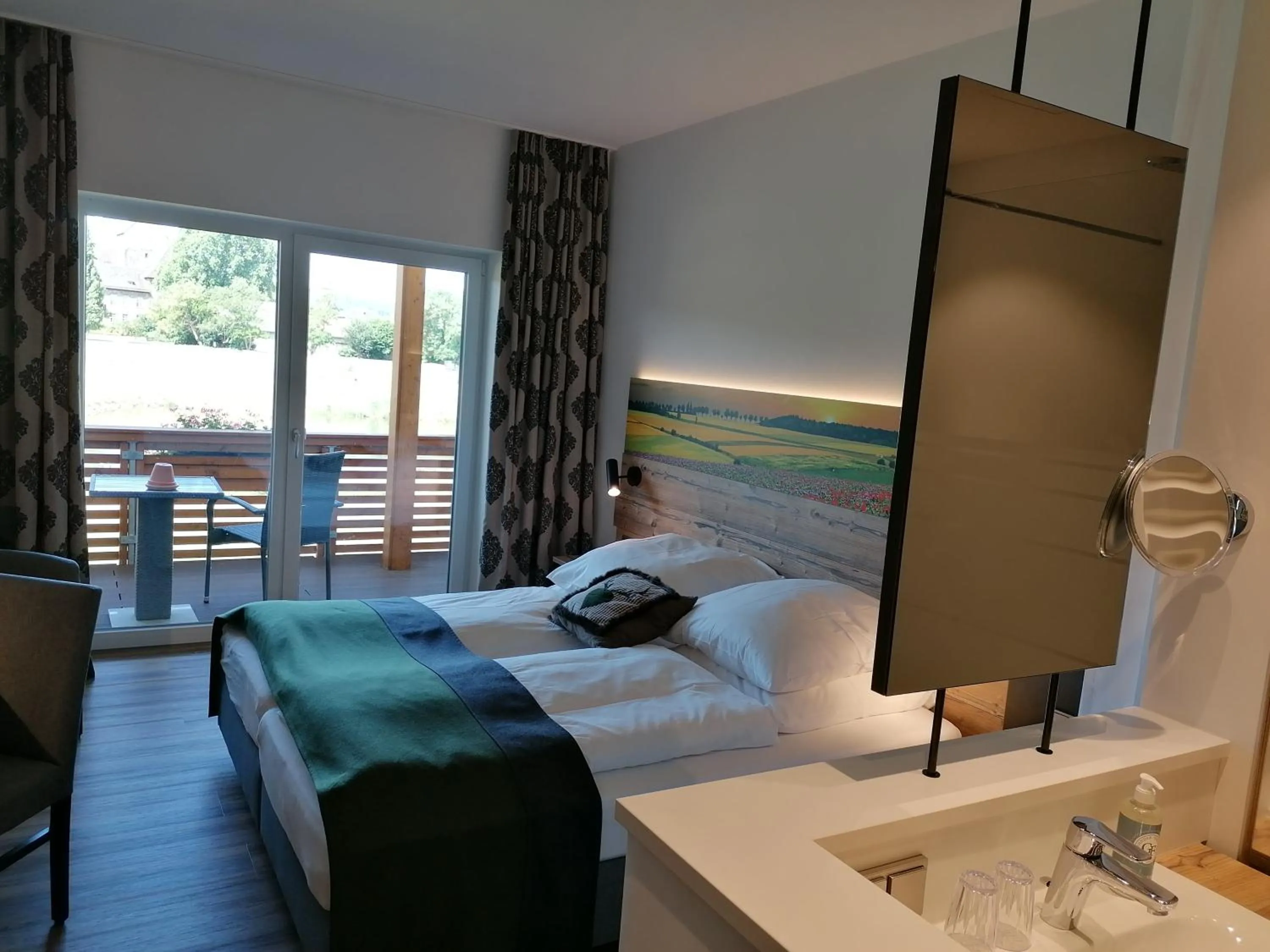 Photo of the whole room, Bed in Hotel Grohnder Fährhaus