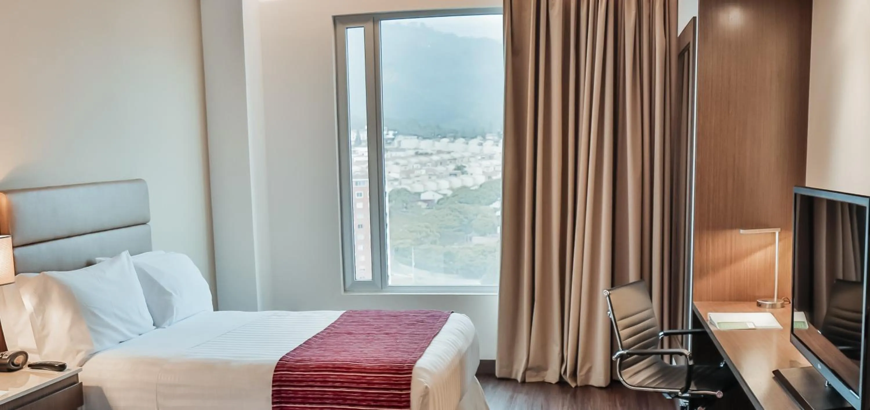 Bed in Holiday Inn Bucaramanga Cacique by IHG