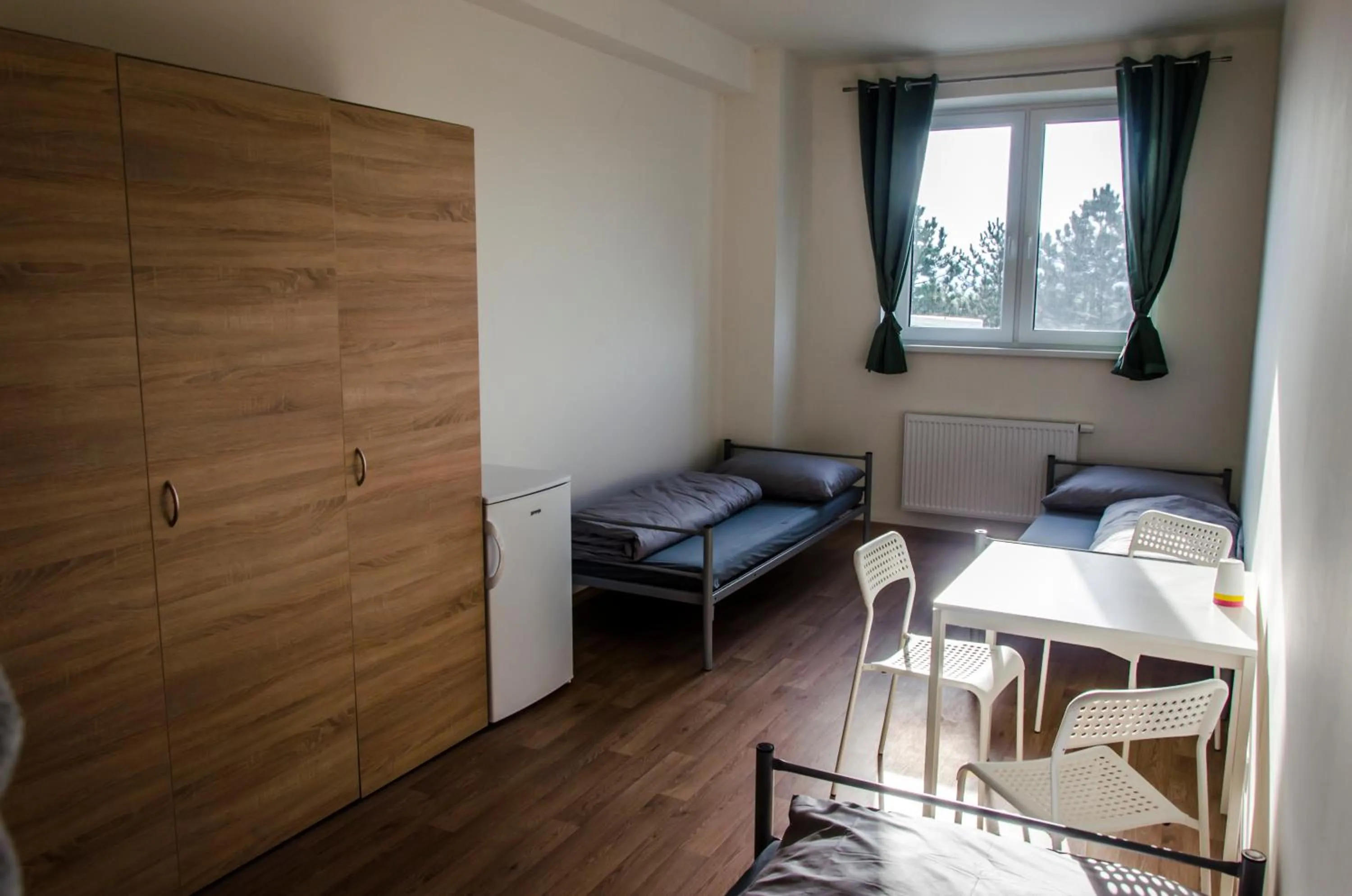 Bed in Ubytovňa Milex