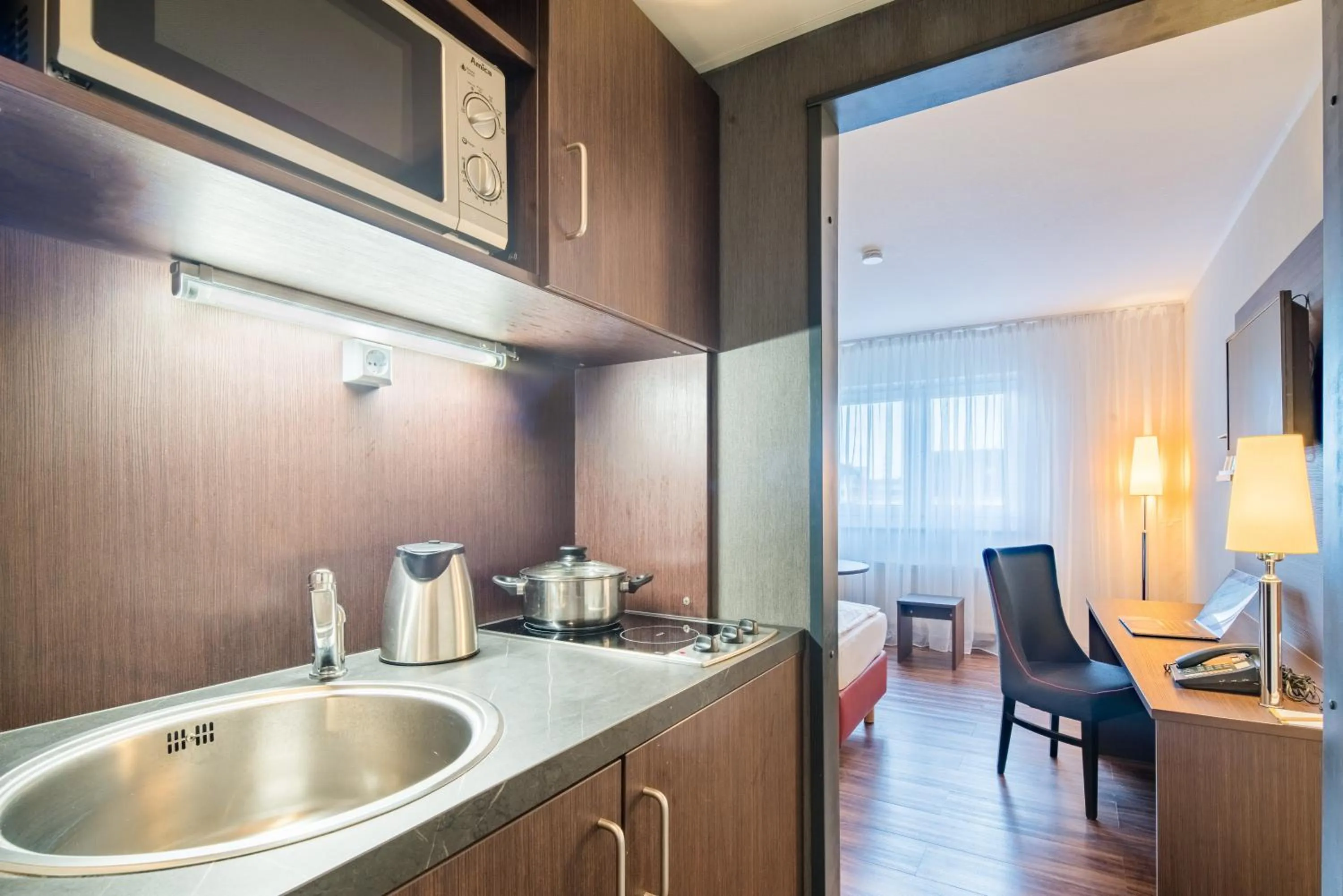 Kitchen or kitchenette in Airways Hotels Frankfurt Airport West