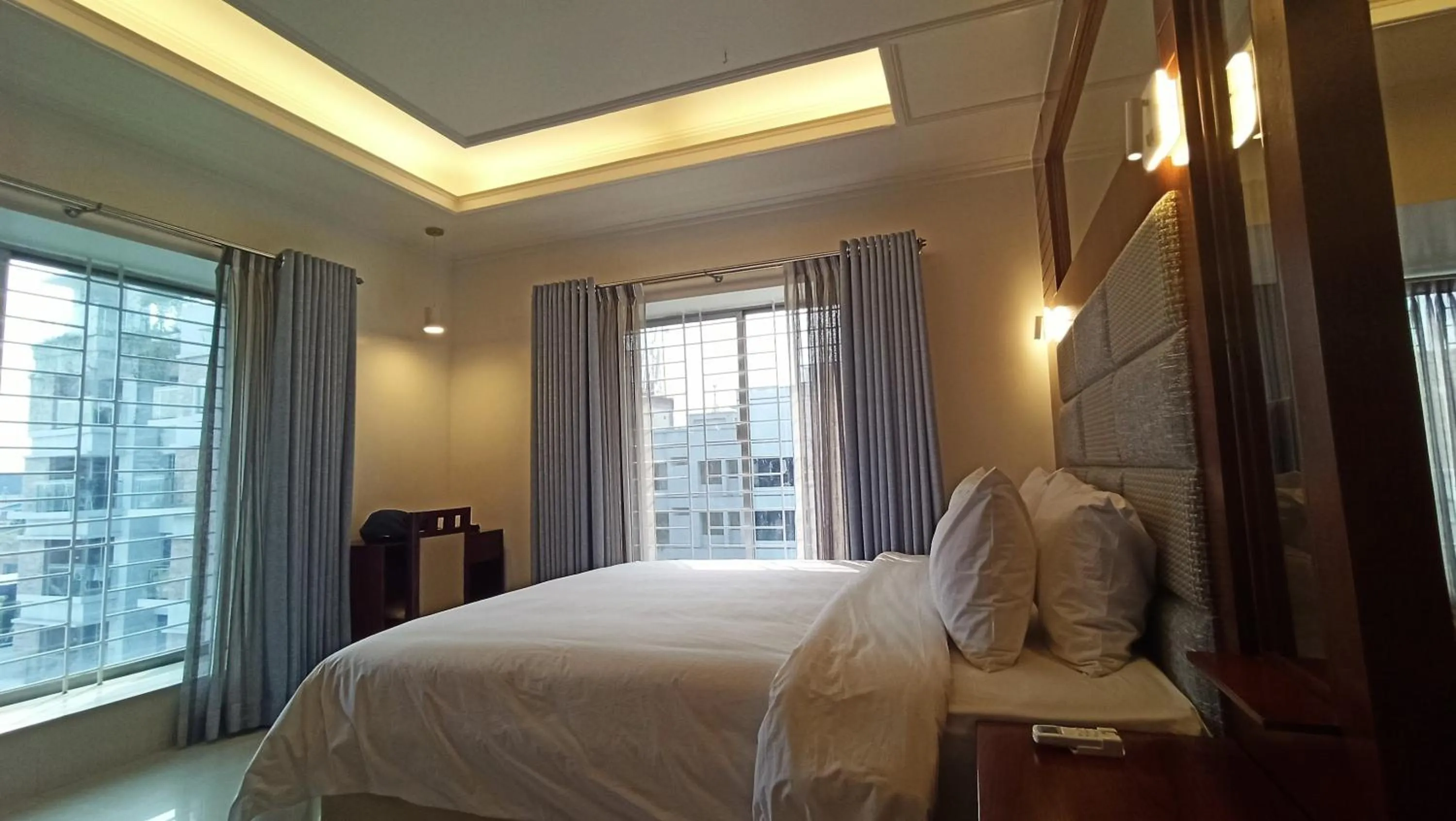Bed in Nascent Gardenia Luxury Suites