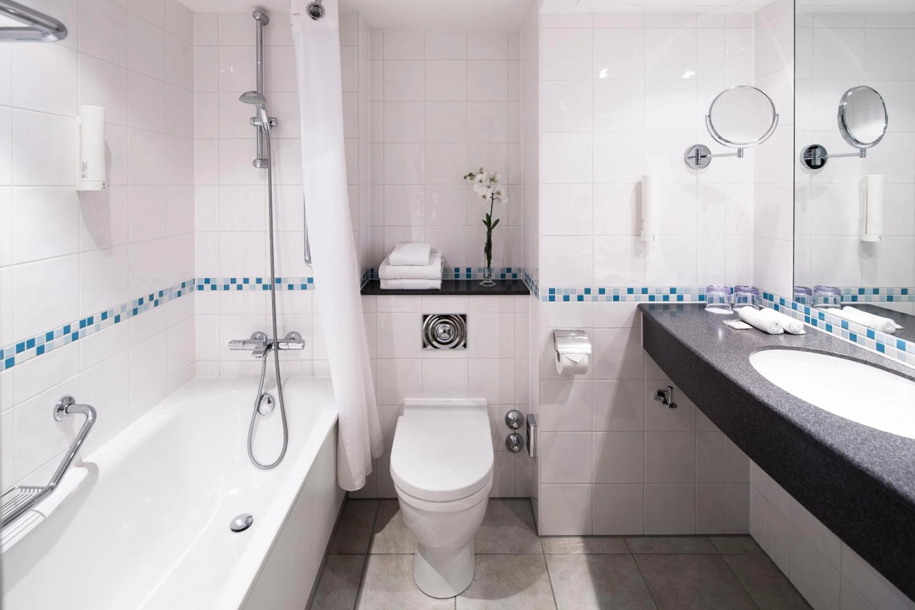 Bathroom in Holiday Inn Munich City Centre by IHG