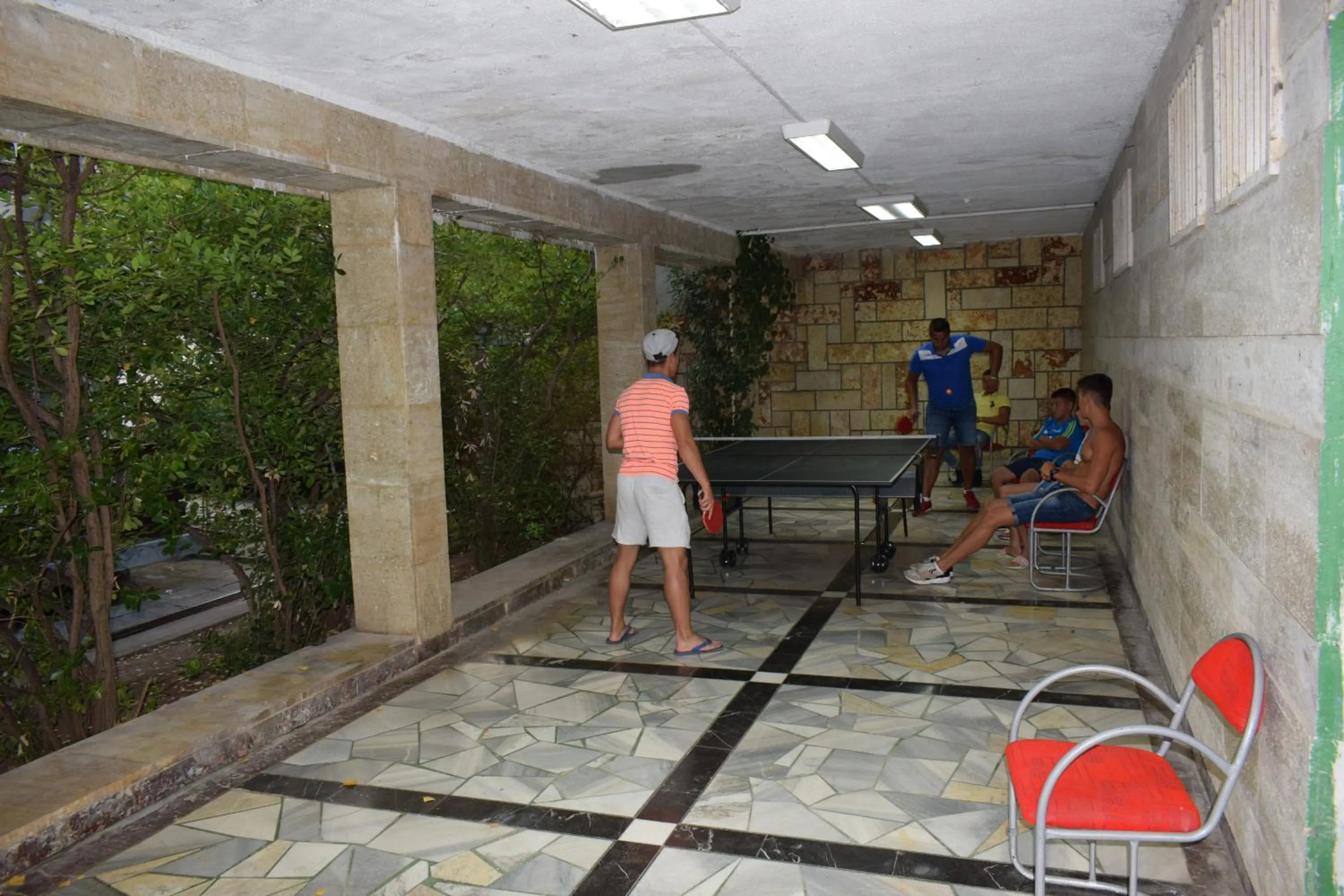 People in Ahilea Hotel - Free Pool Access