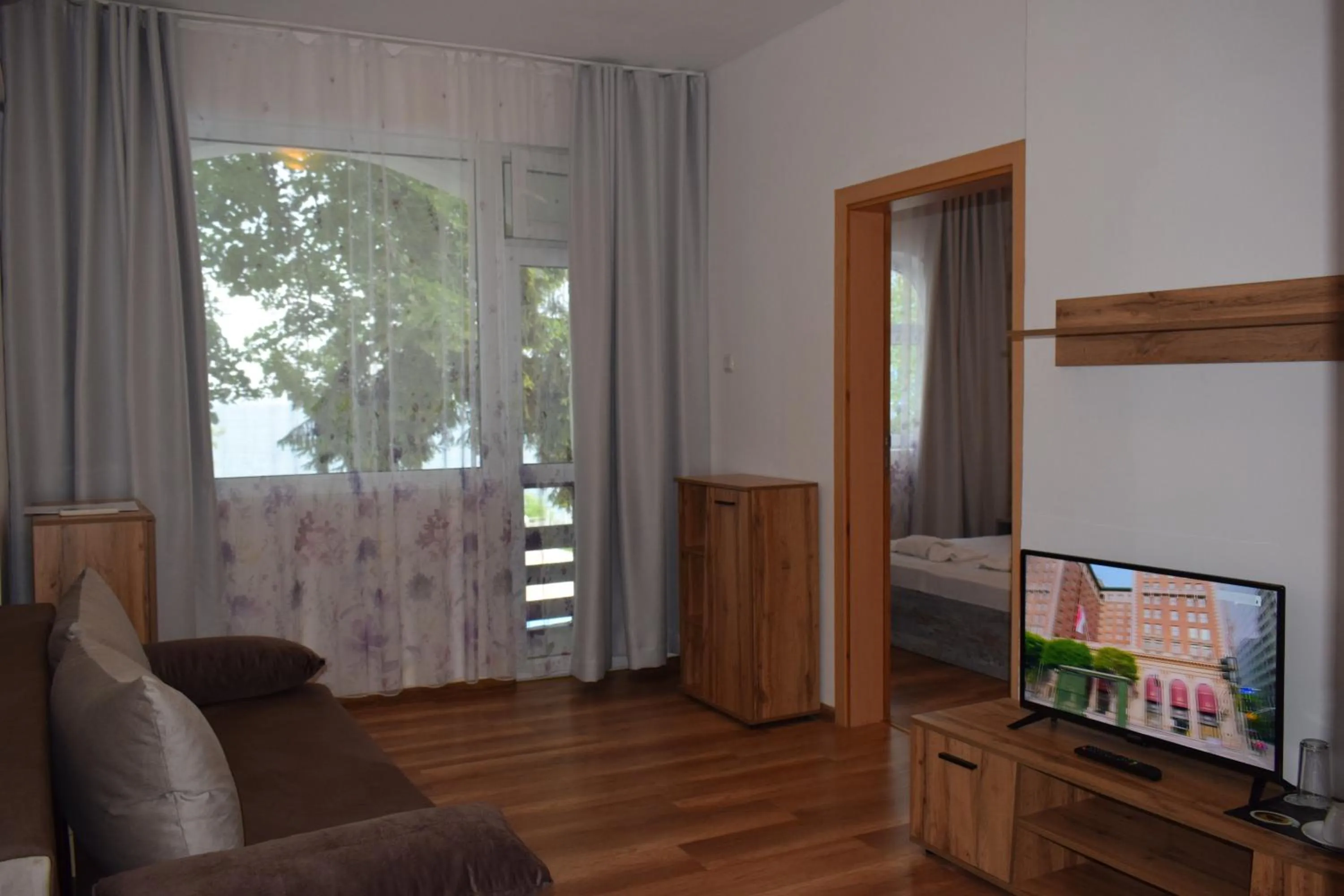 Living room in Ahilea Hotel - Free Pool Access