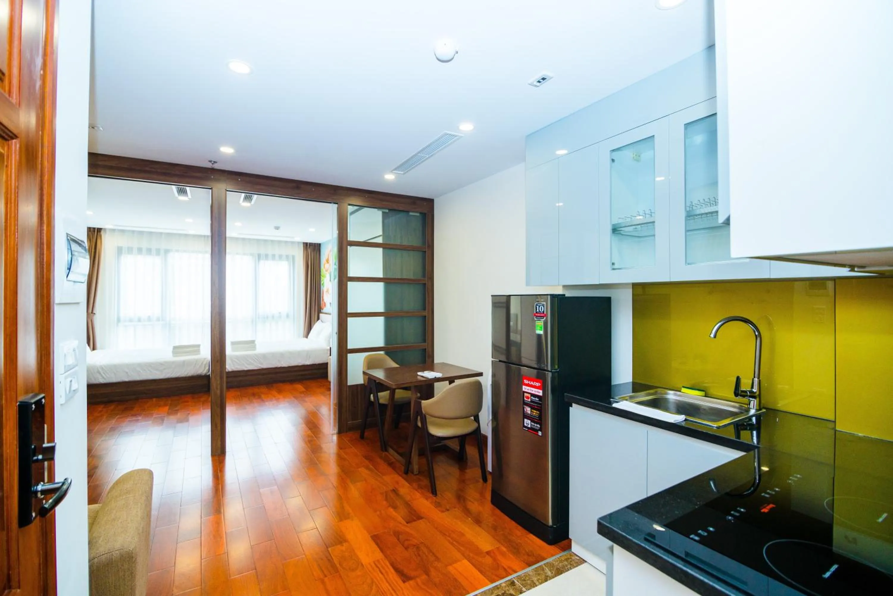 Kitchen or kitchenette in HANA Stay