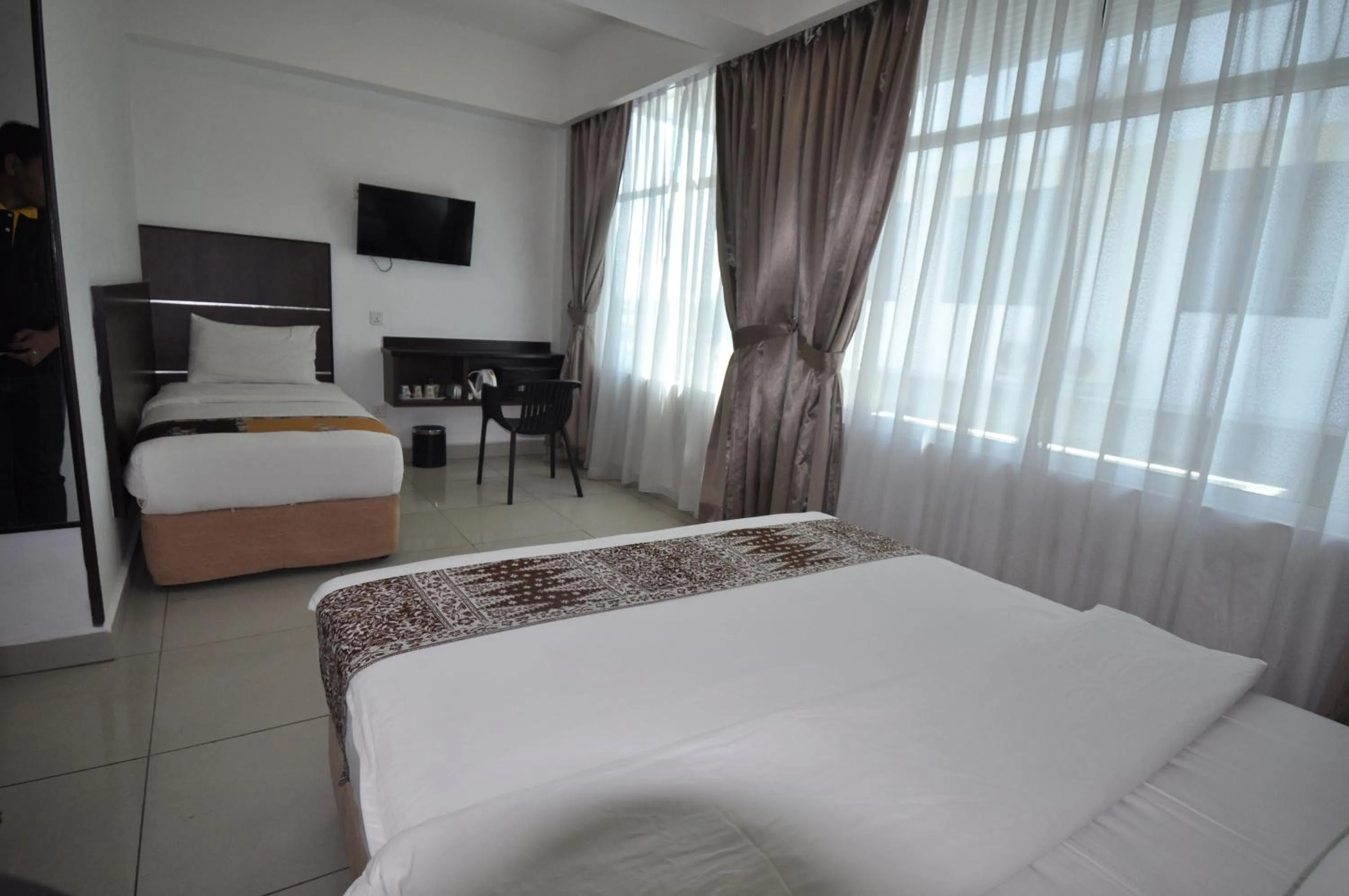 Bed in Sipadan Inn 3