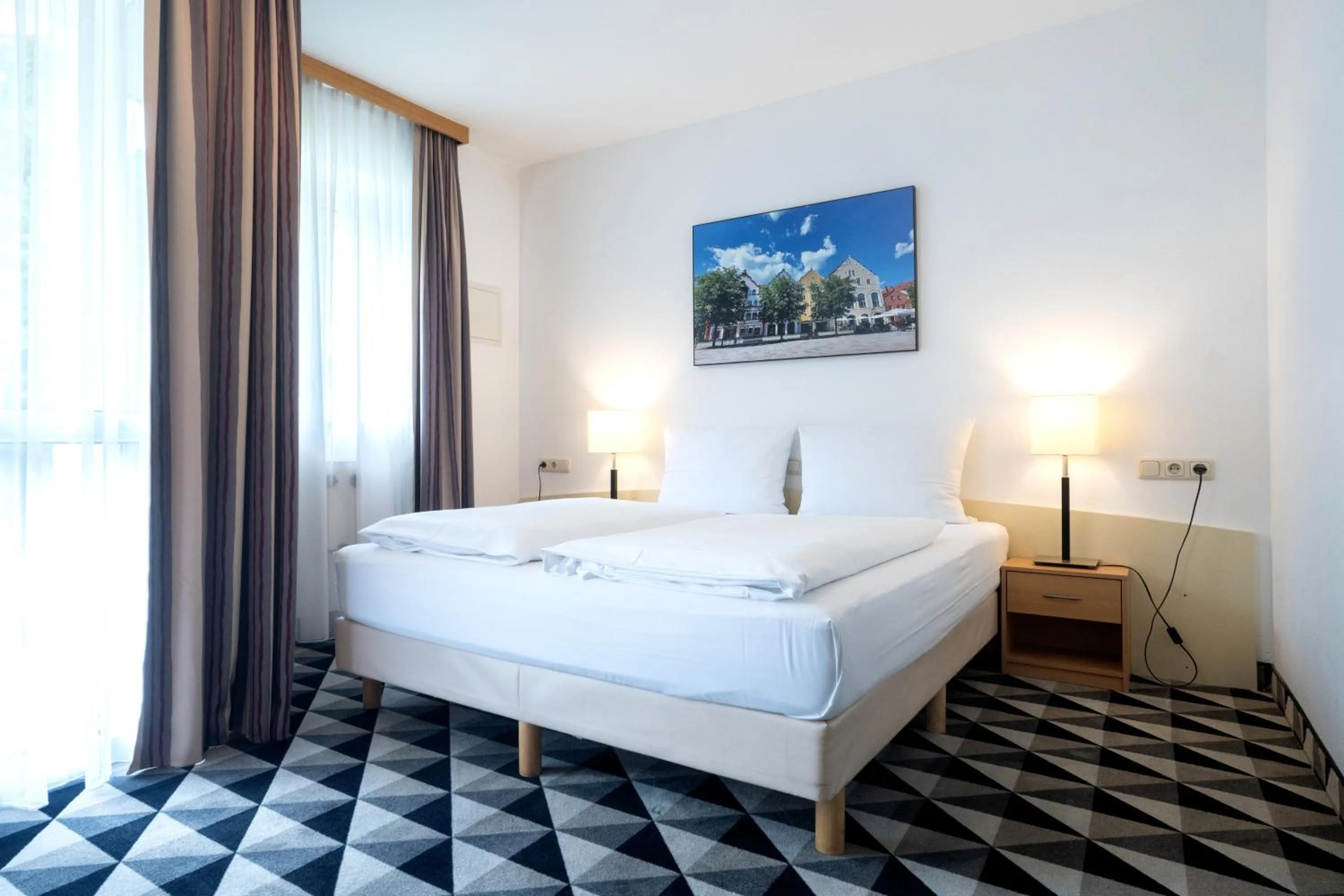 Bed in Andante Hotel Erding