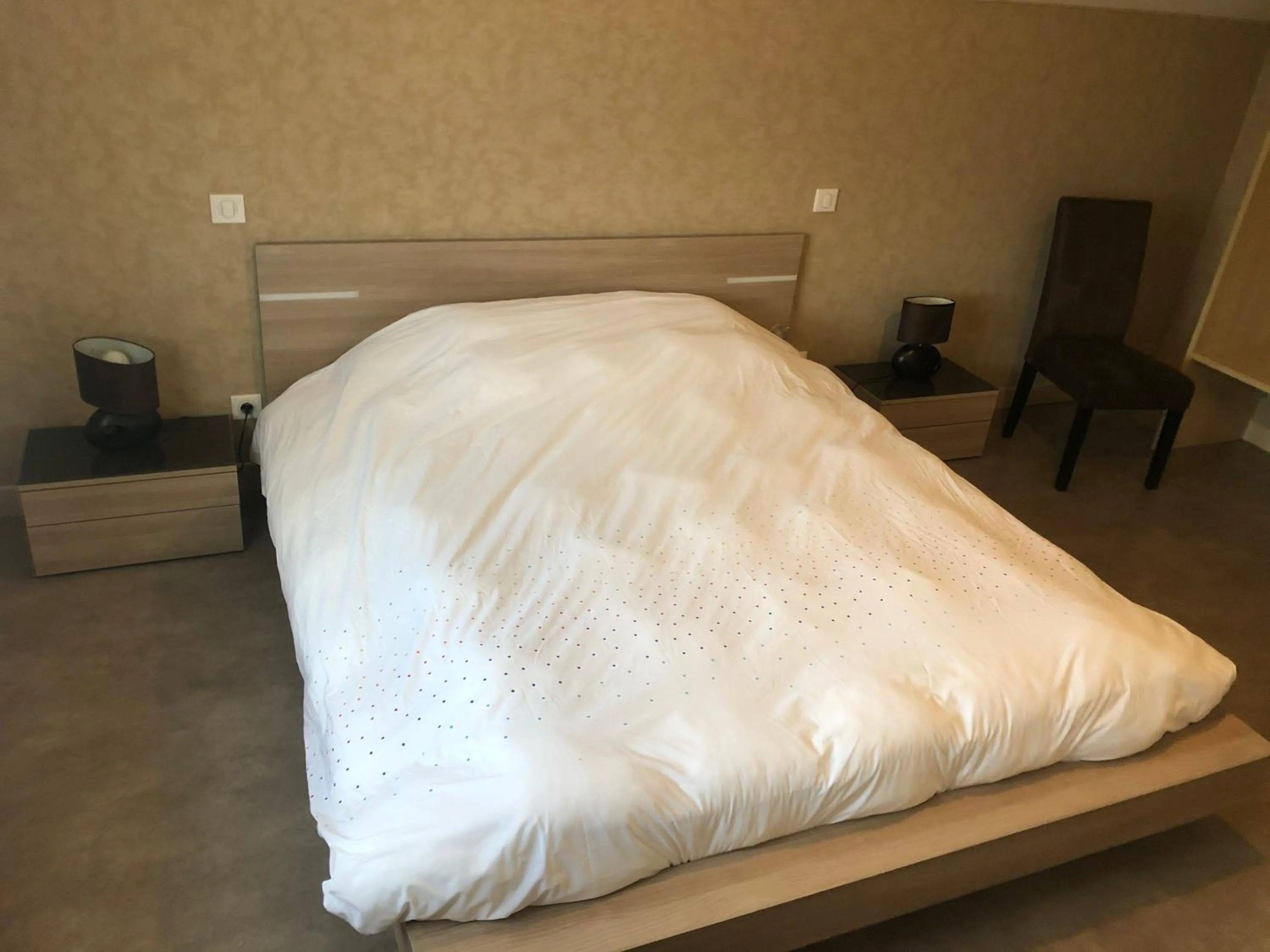 Bed in Maison d'hôtes La Colombelle