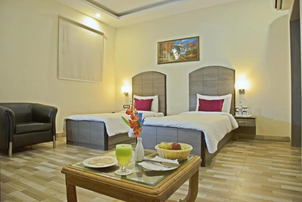 Photo of the whole room, Bed in Spring Sky Mughalsarai By ShriGo Hotels