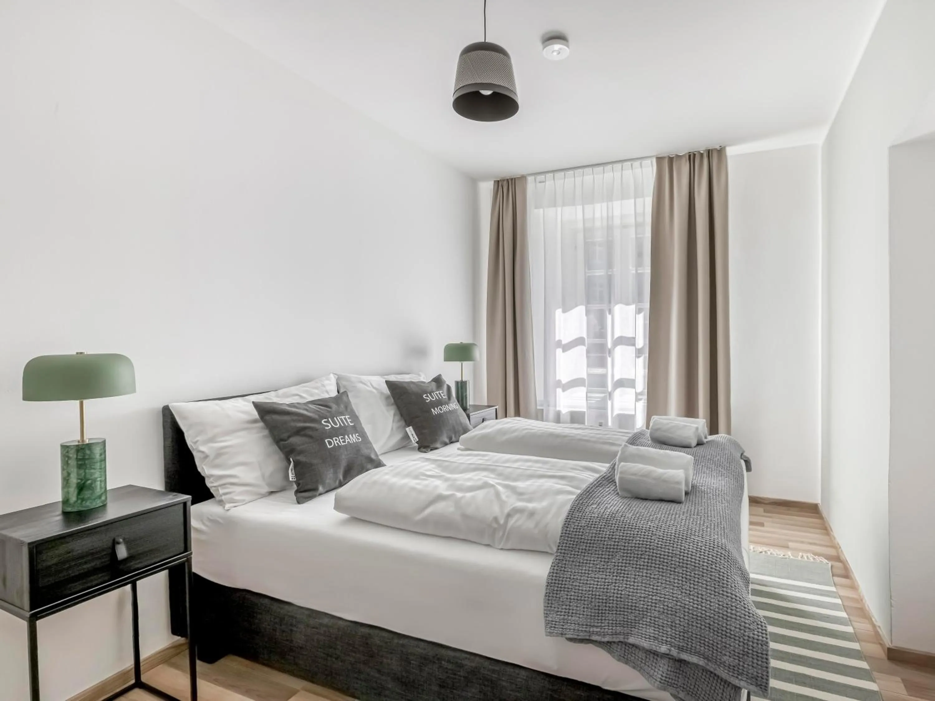 Bed in Limehome Villach Kirchenplatz