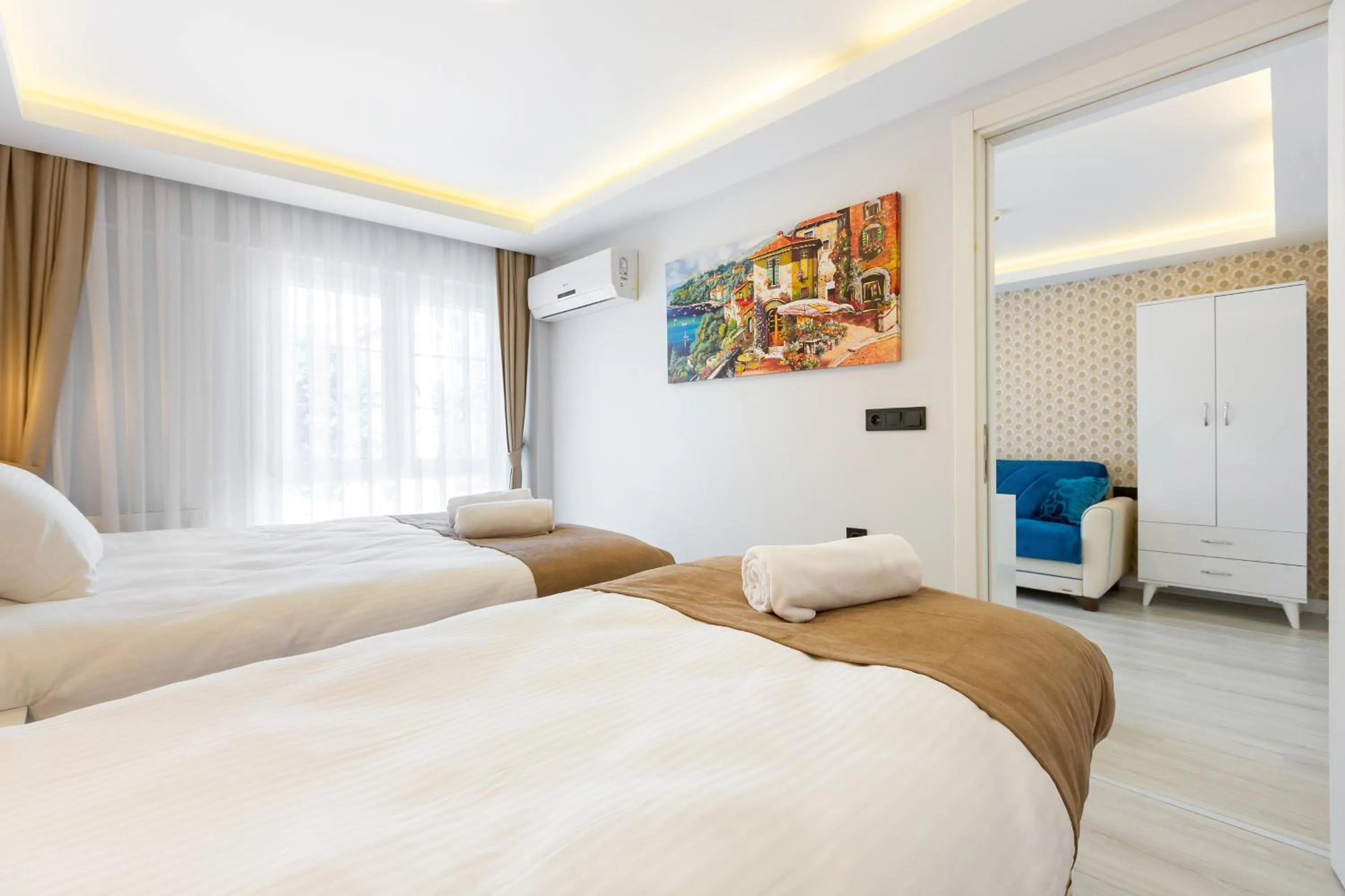Bed in BLUE MARMARA SUITES