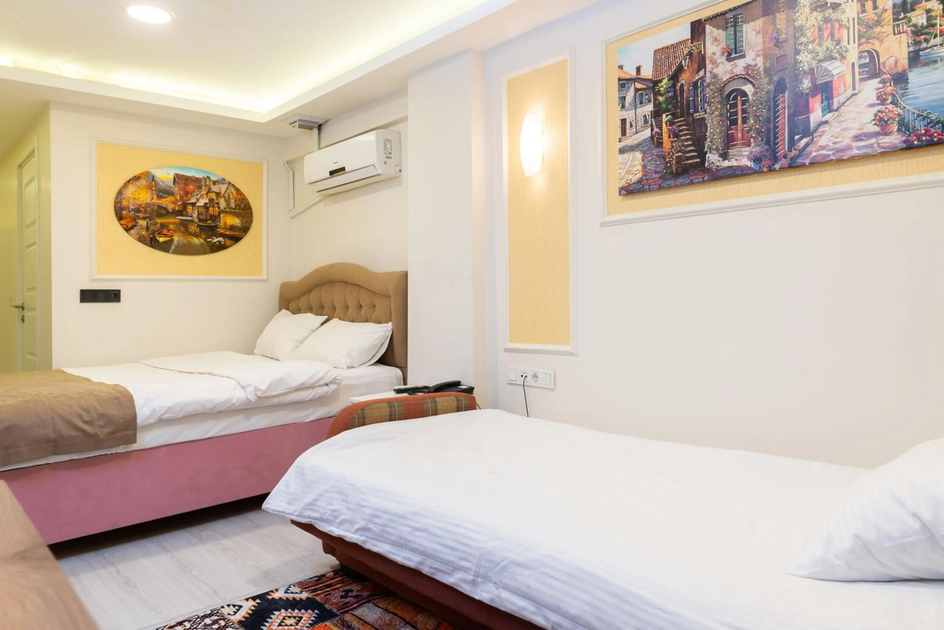 Bed in BLUE MARMARA SUITES