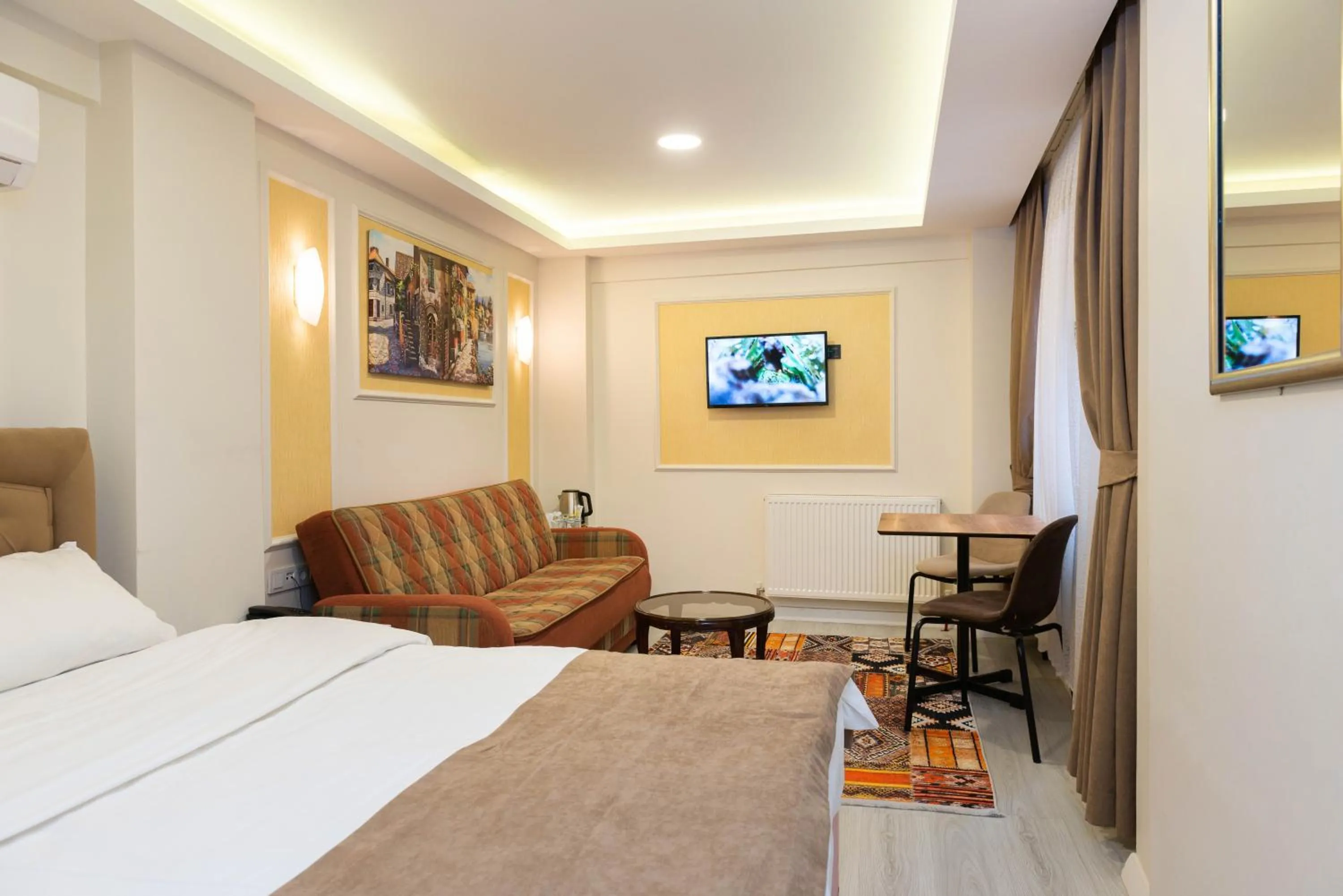 Bed in BLUE MARMARA SUITES