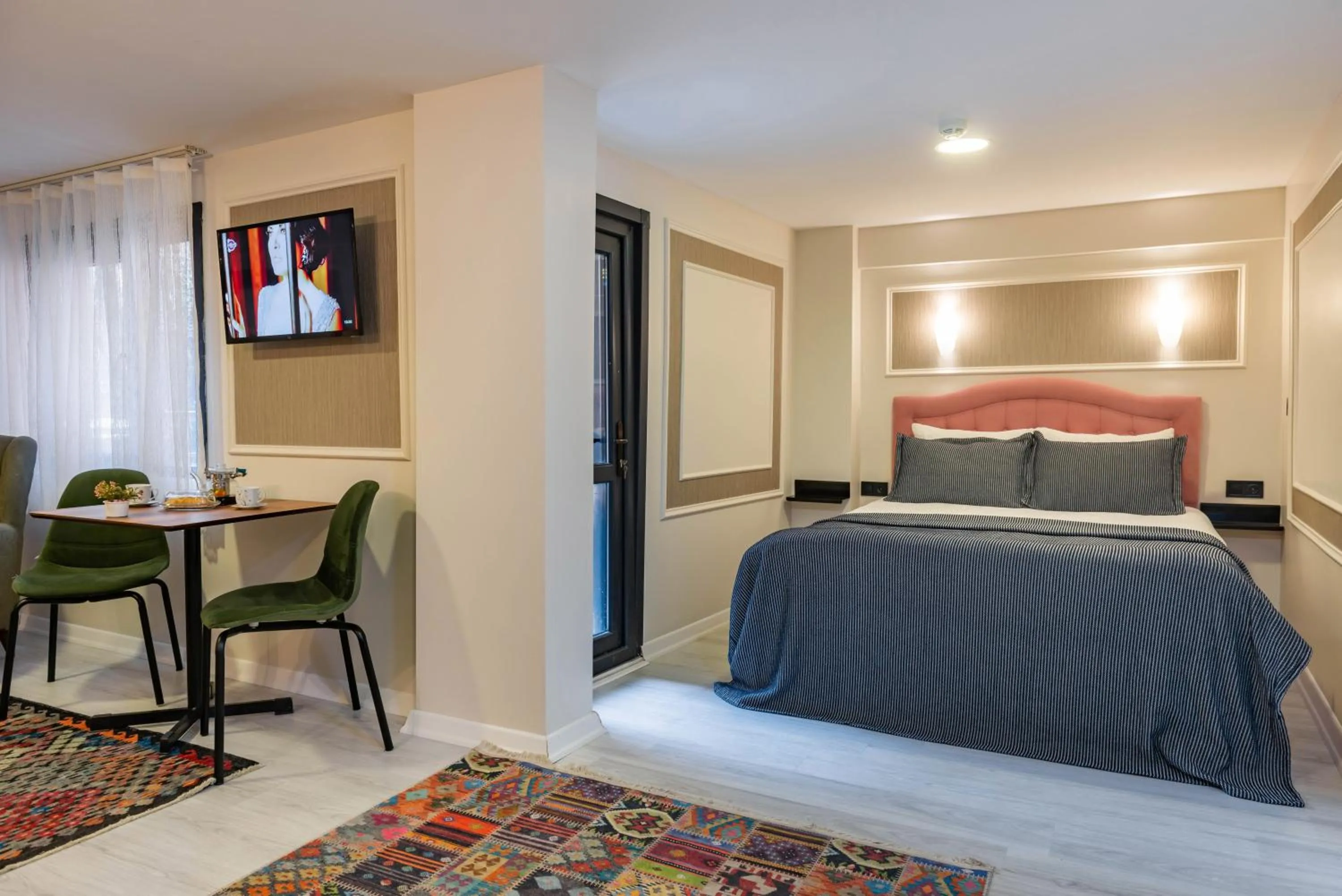 Bed in BLUE MARMARA SUITES