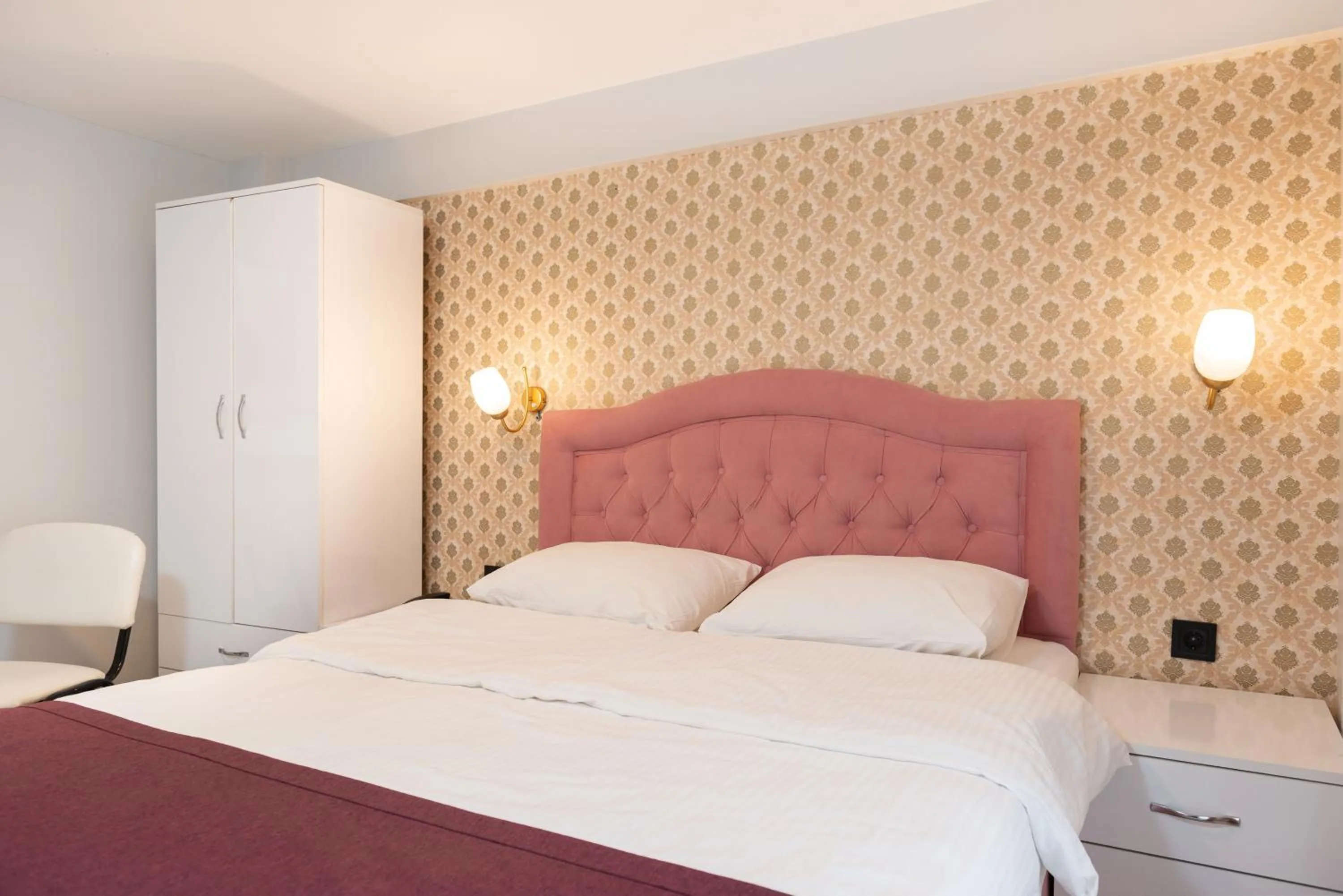 Bed in BLUE MARMARA SUITES