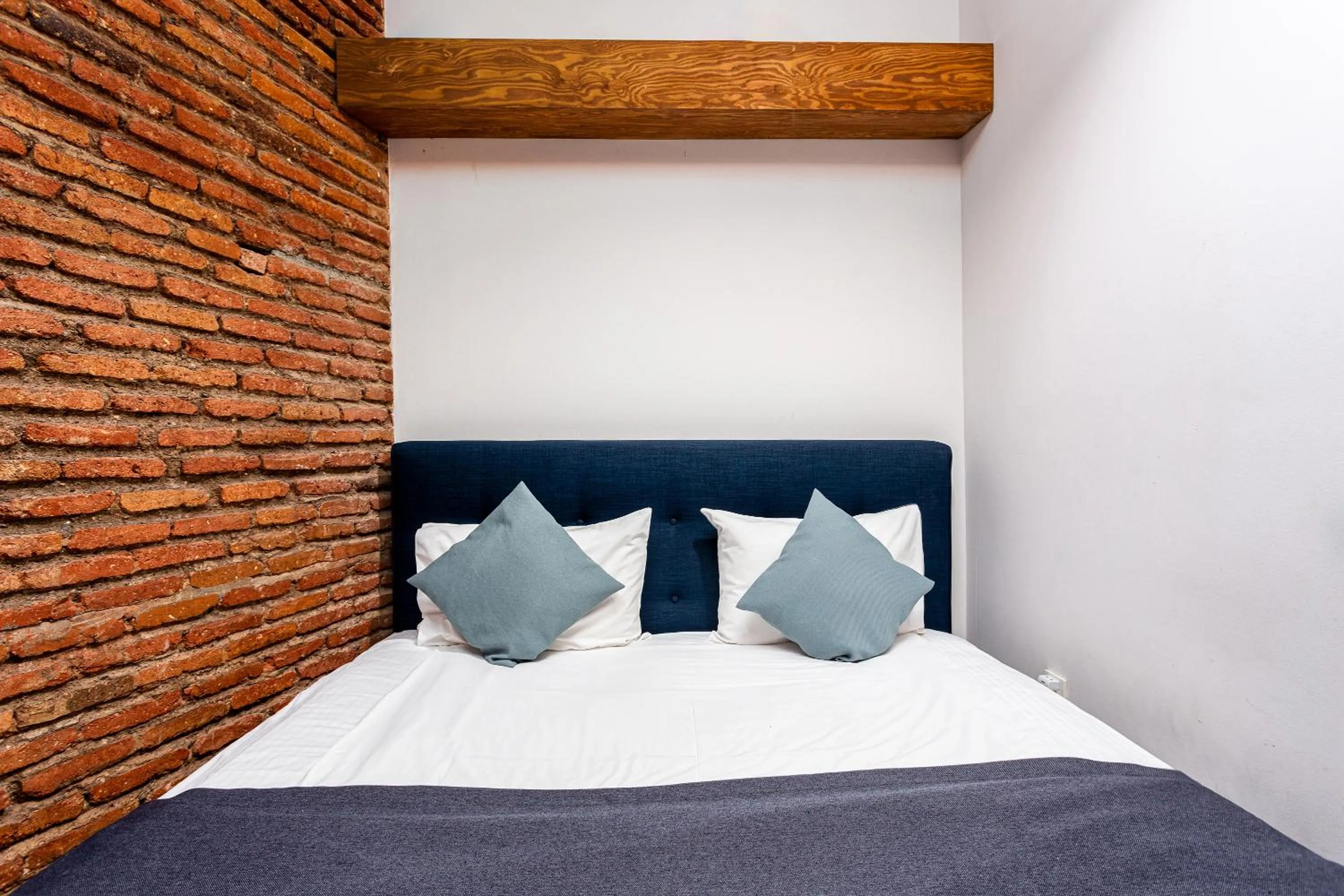 Bed in Ethnograph Old Tbilisi Hotel