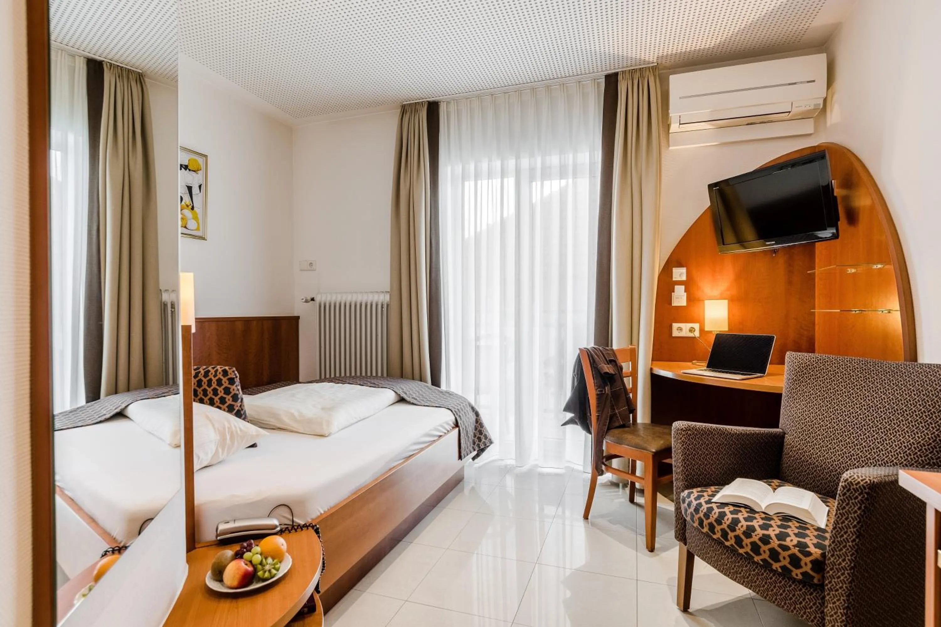 Photo of the whole room, Bed in Wellness- und Gartenhotel Heusser