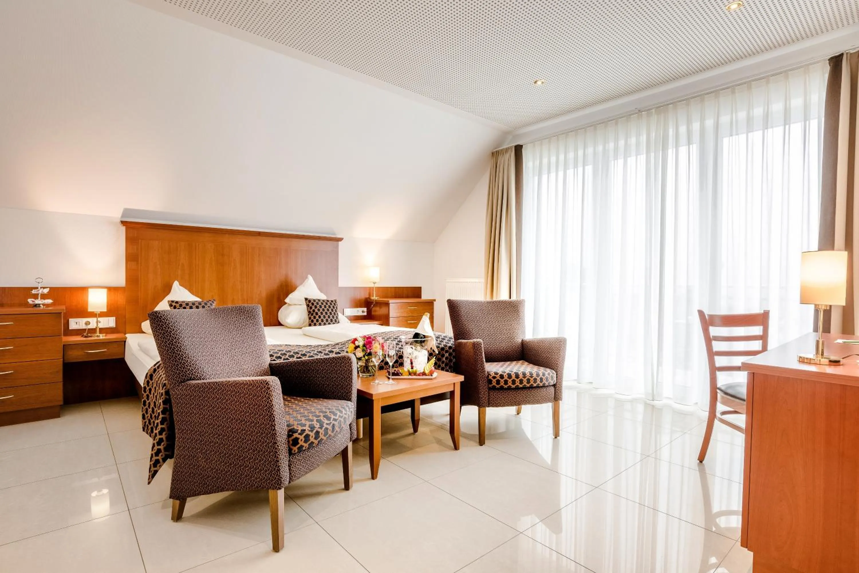 Bedroom in Wellness- und Gartenhotel Heusser