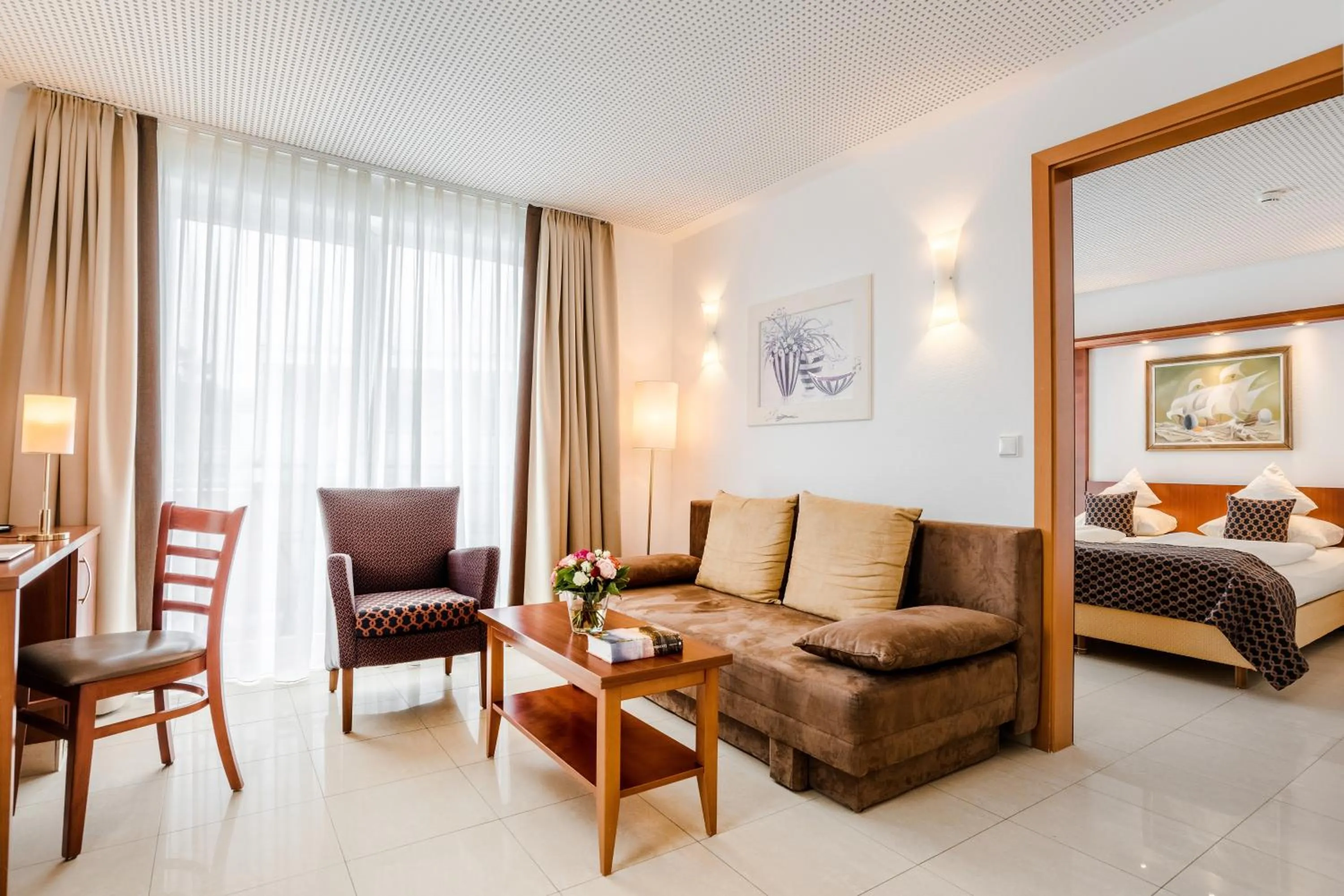 Living room, Bed in Wellness- und Gartenhotel Heusser