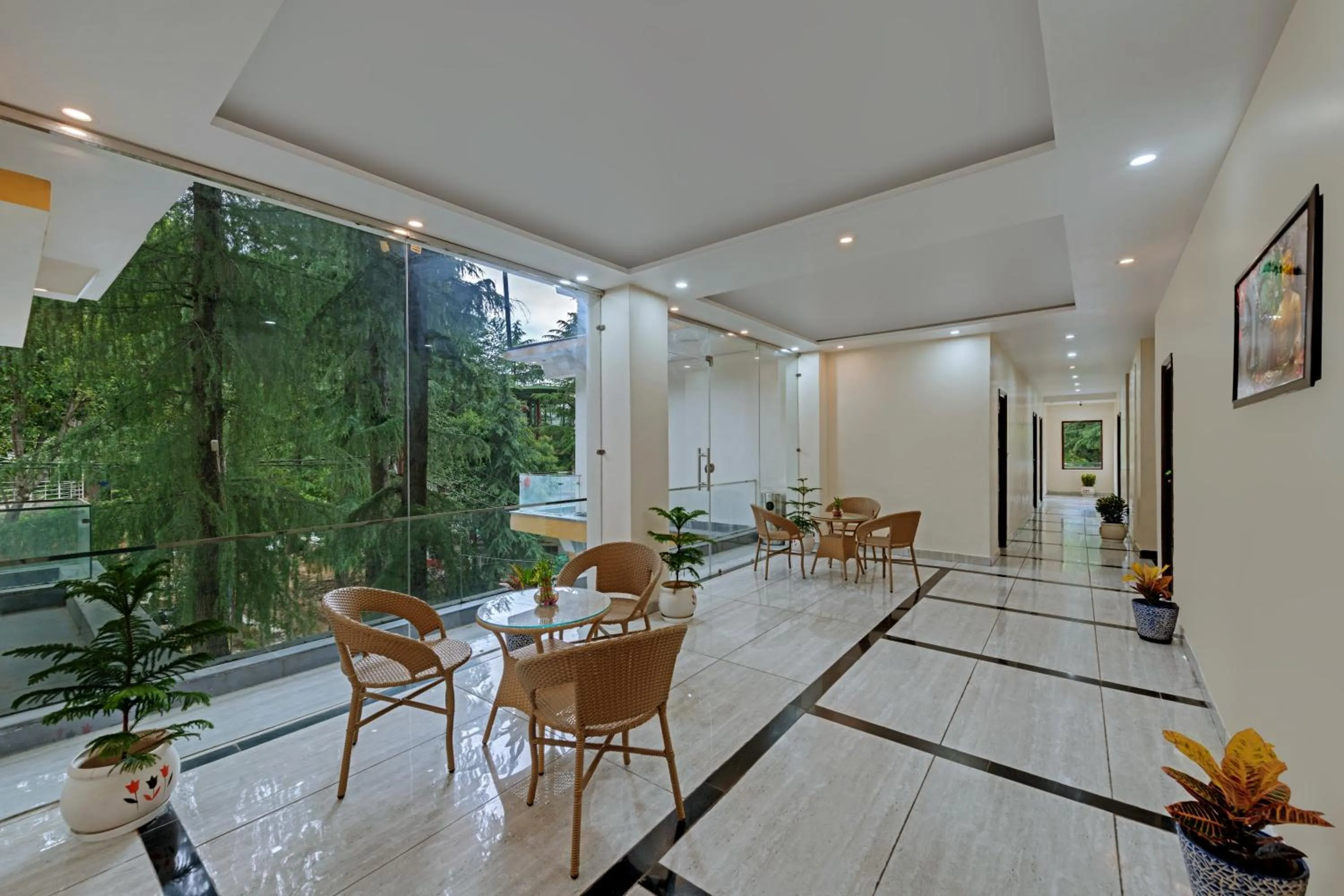 Living room in Golden Rock, Dharamshala - AM Hotel Kollection