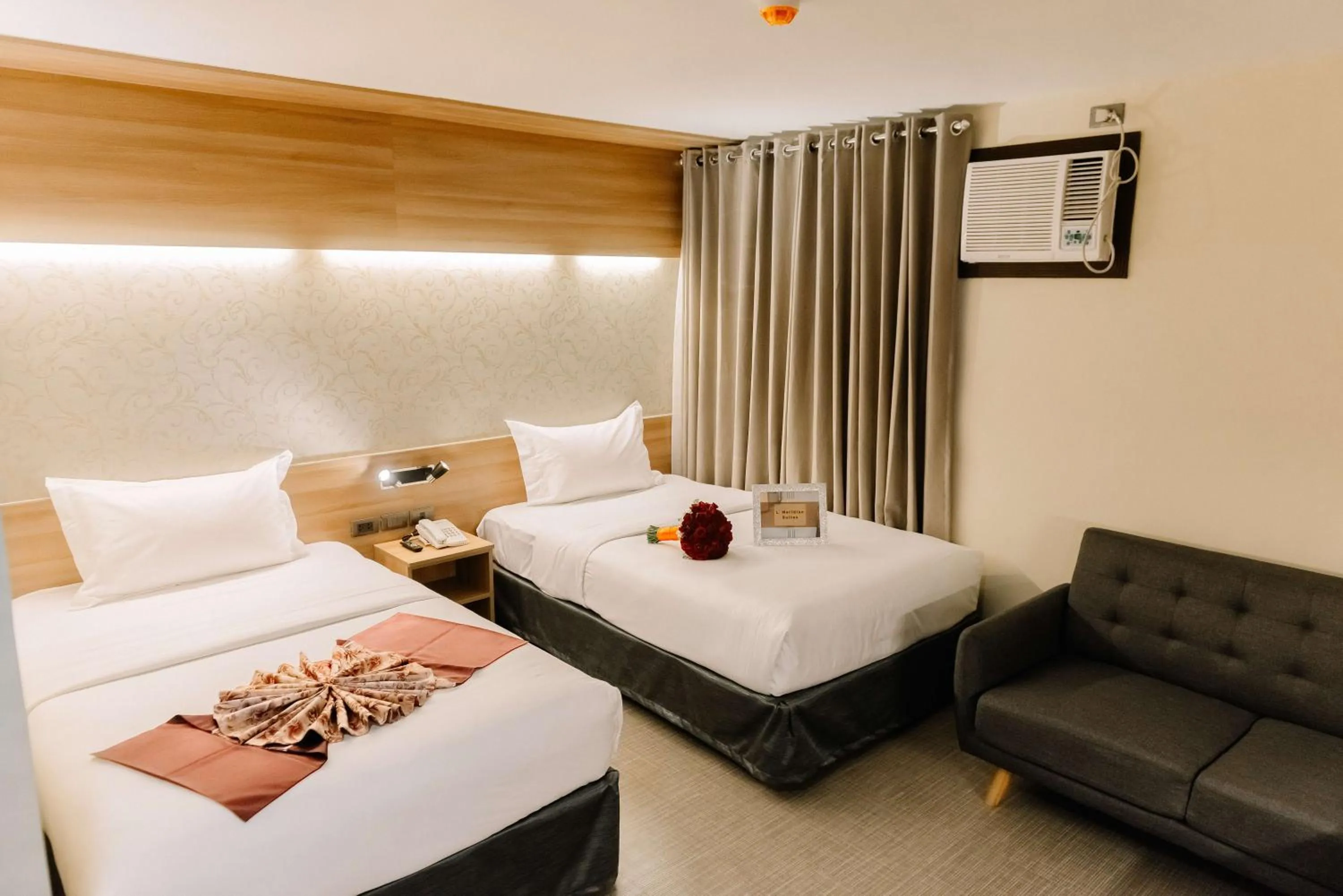 Bed in L' Meridian Suites