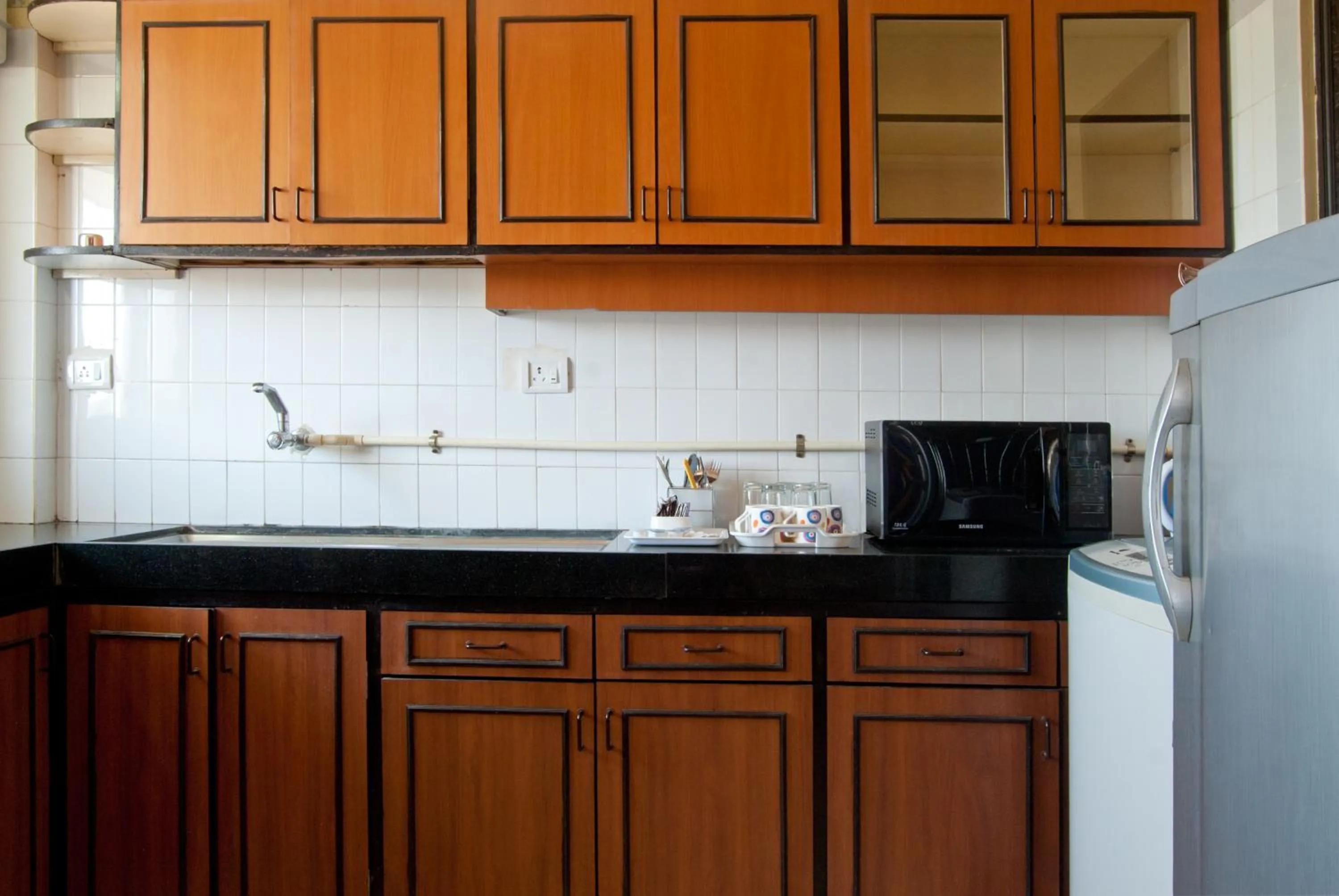 Kitchen or kitchenette in Landmark Asia Serviced Apartments