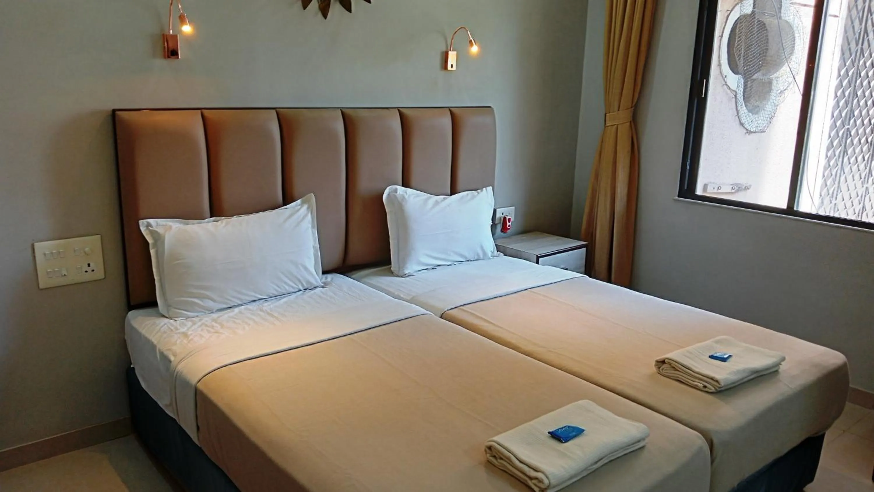 Bed in Landmark Asia Serviced Apartments