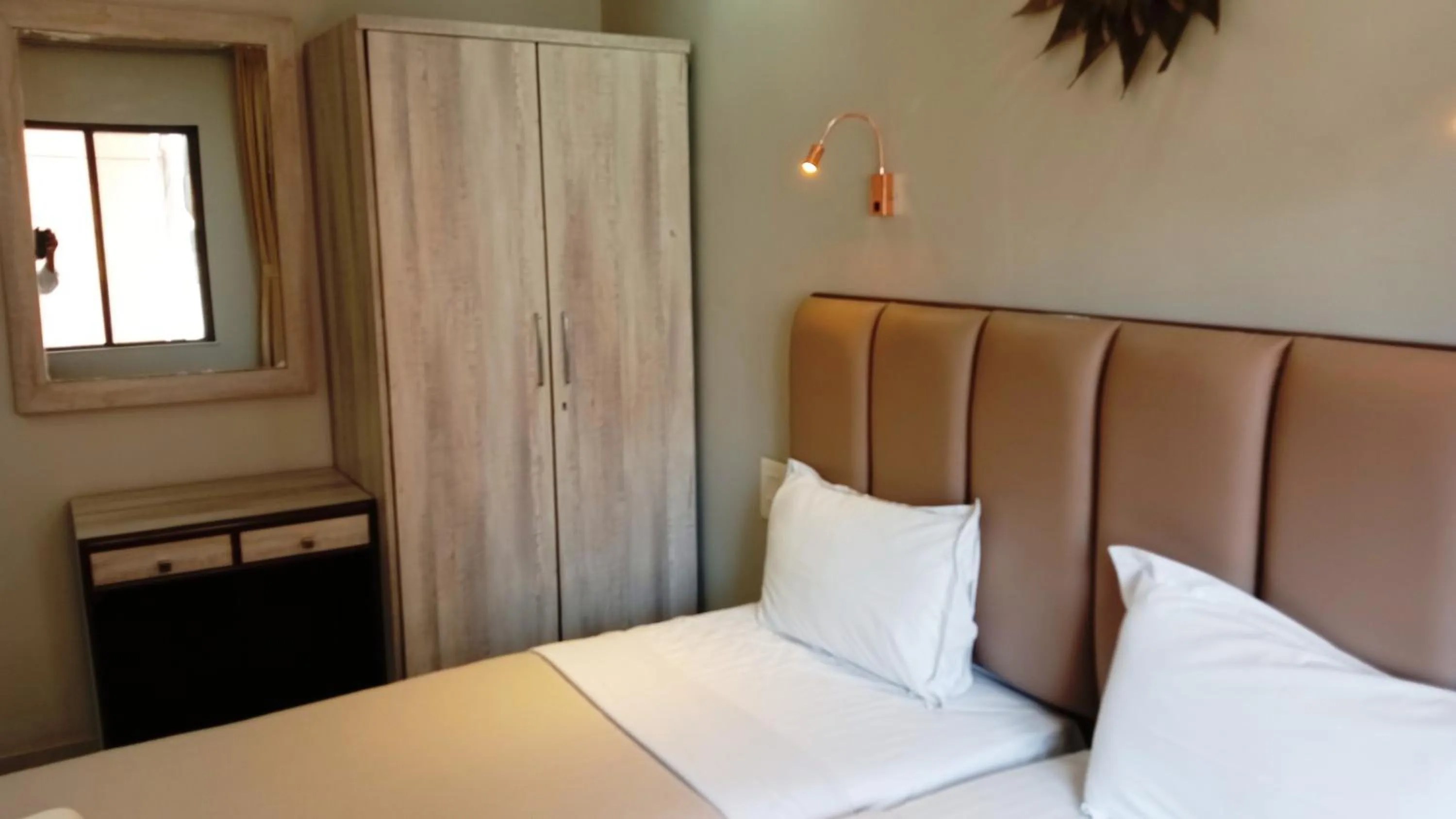 Bed in Landmark Asia Serviced Apartments