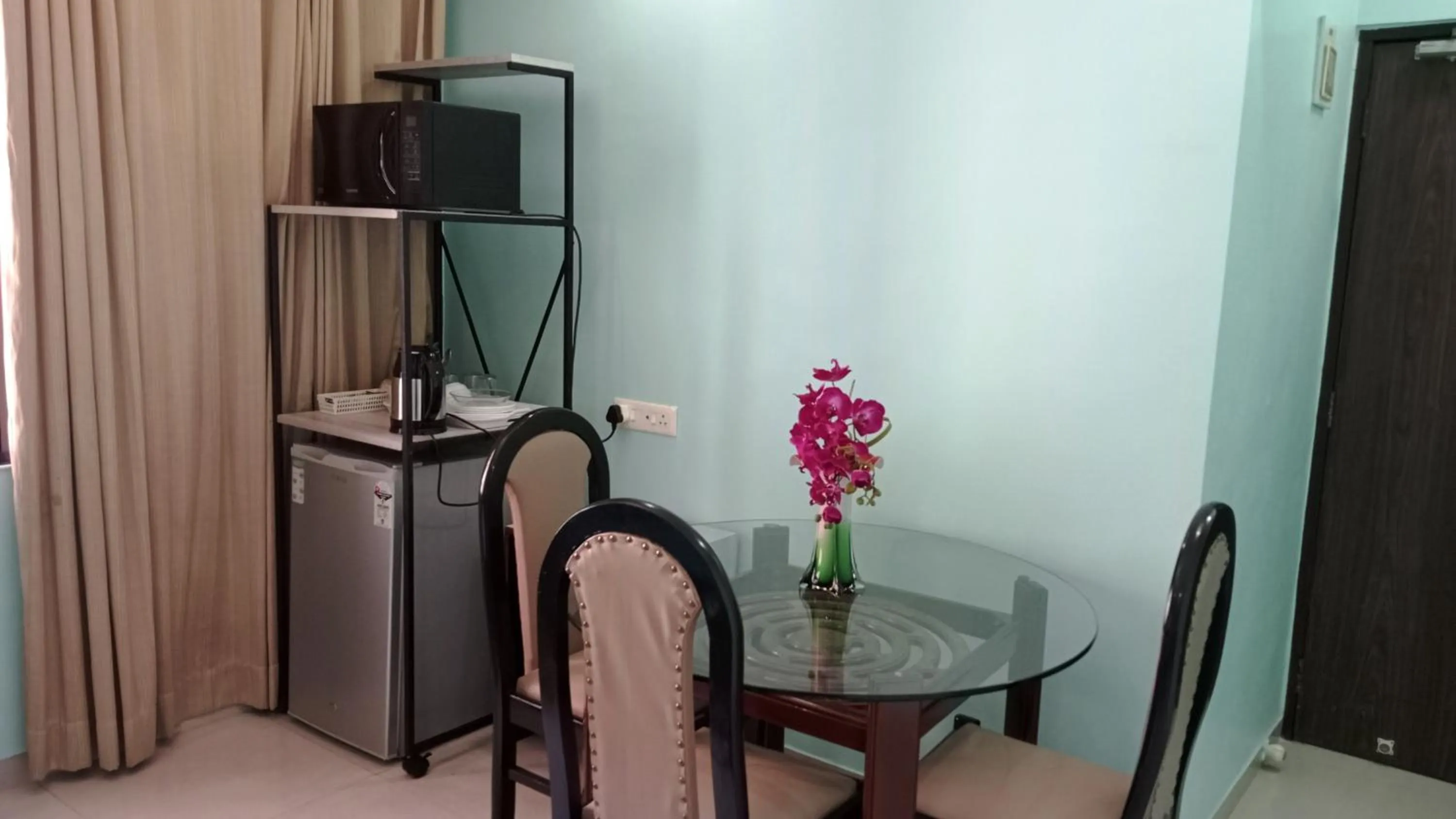 Dining area in Landmark Asia Serviced Apartments