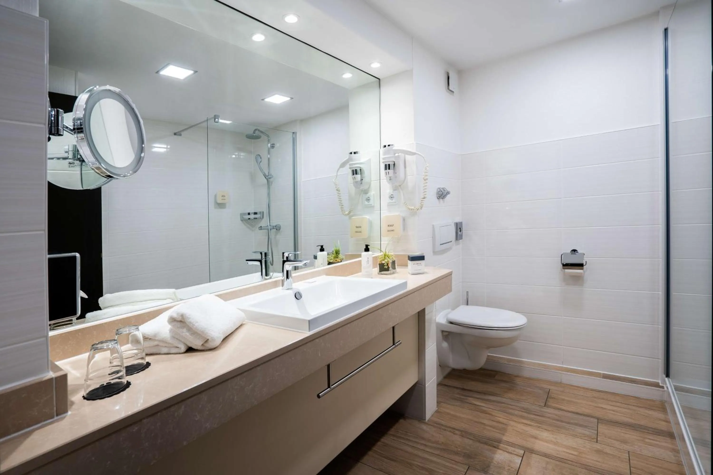 Bathroom in ATLANTIC Hotel Landgut Horn